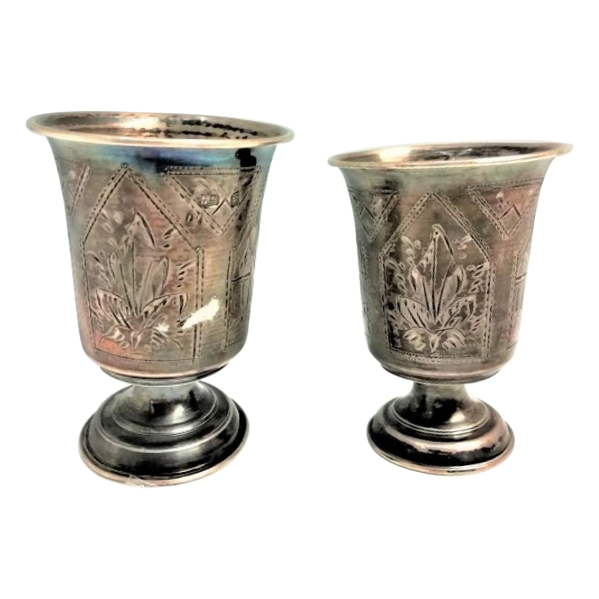 Pair of silver cups with Russian-style engraving