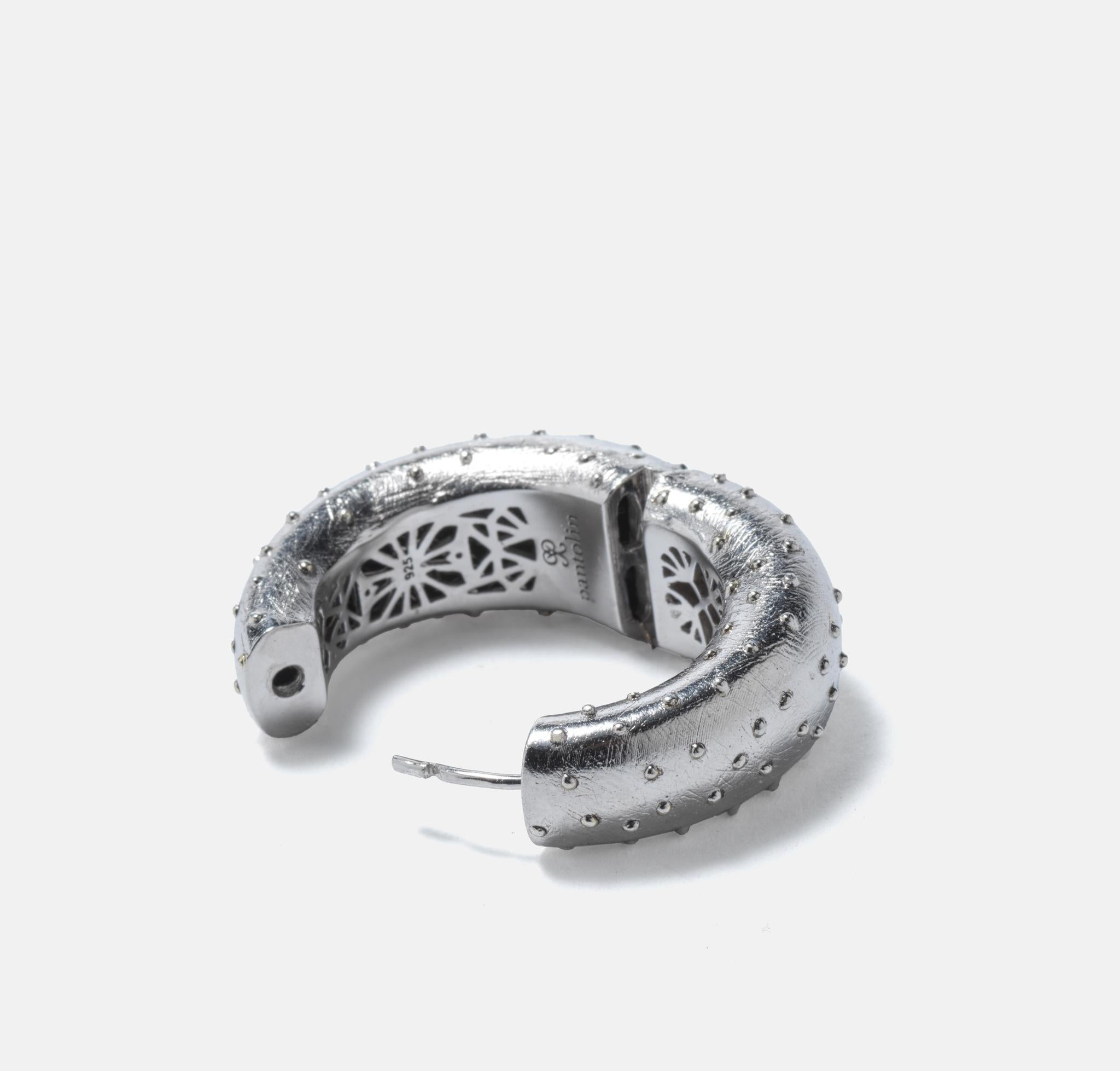 Pair of silver ear rings by Swedish designer Paula Pantolin. For Sale 2
