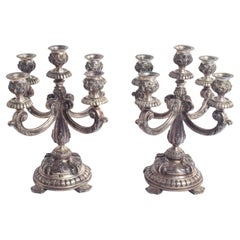 Paire de chandeliers argentés à cinq lumières