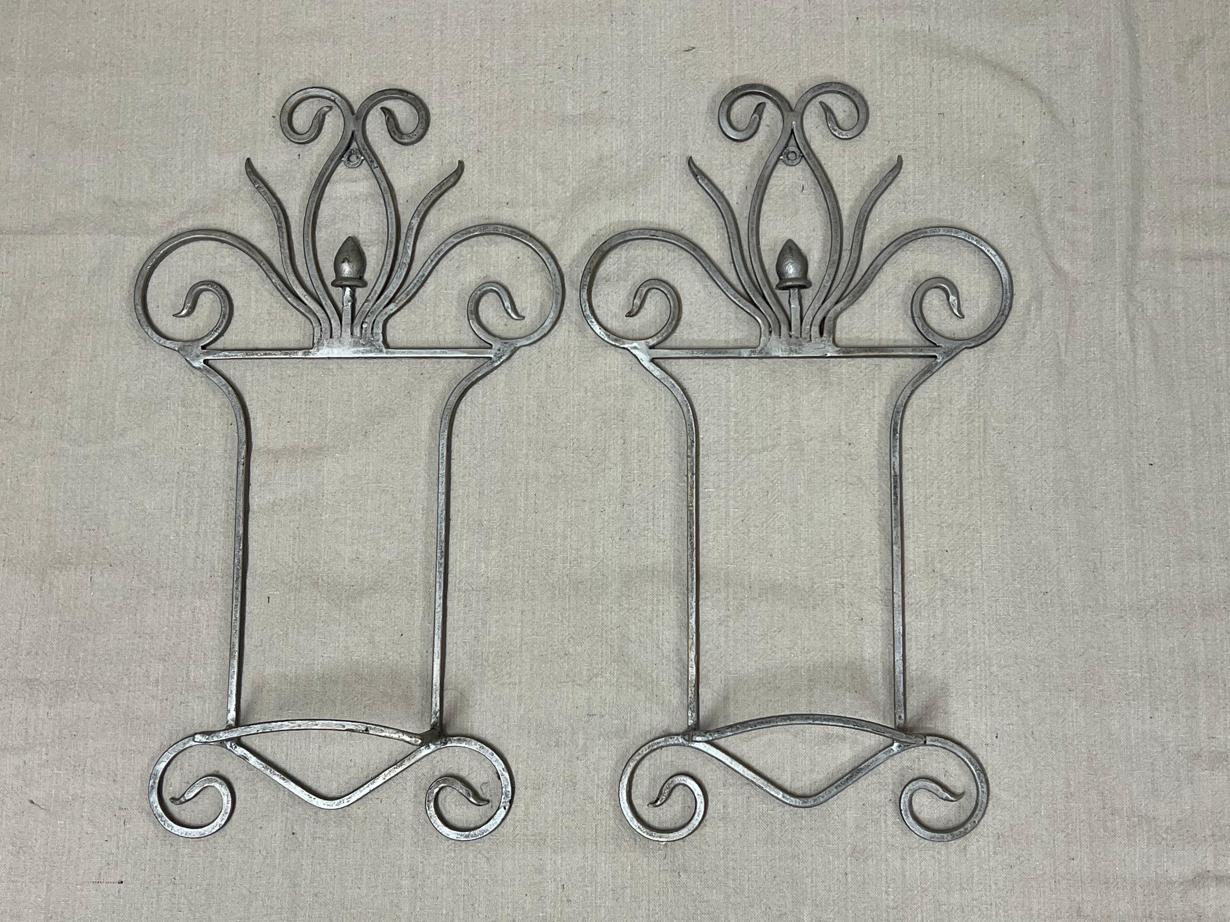 Price is for 2 . A pair. 
Pair of Large Silver Floral Hand Towel Racks. Nice decorative racks to hold towels or scarves . Perfect for that formal powder room to hold your monogrammed linen hand towels. Or use in a dressing room to hang scarves on.