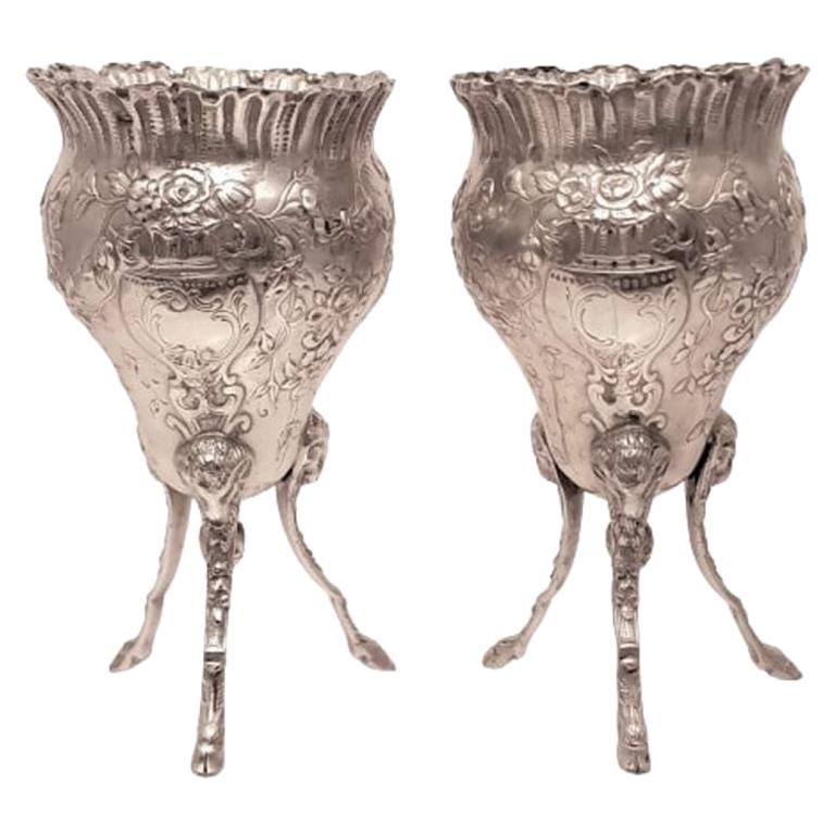 Pair of Silver Footed Vases with Flowers and Bows