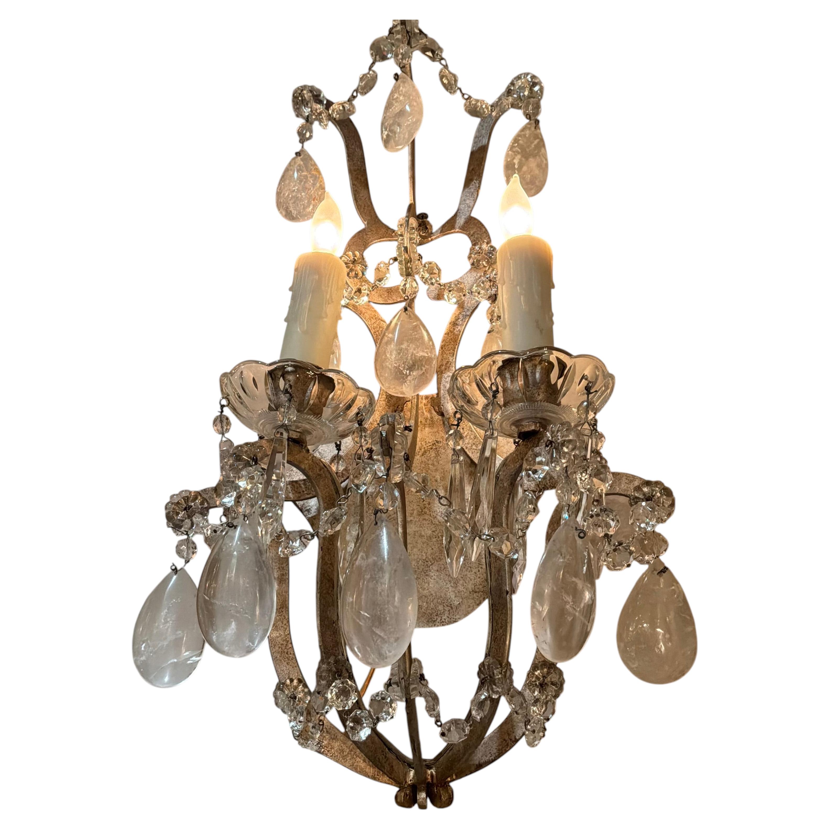 Pair of silver gilt metal sconces with rock crystal prisms