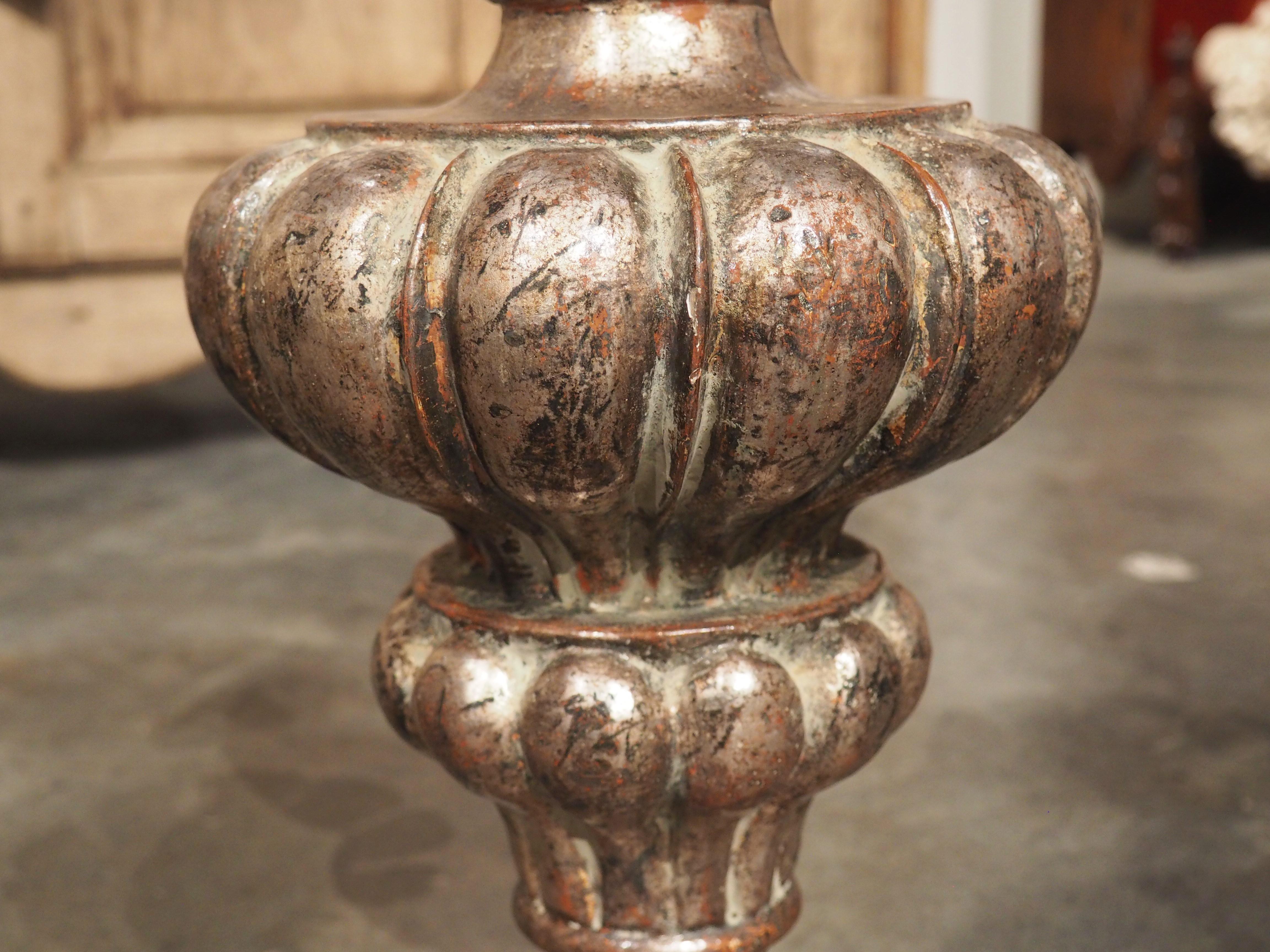 These silver gilt candlesticks from Tuscany have been crafted in the style of the 17th and 18th century altar prickets and are suitable for many aesthetics. These are finished in an antiqued silver patination, adding a distinctive touch to your