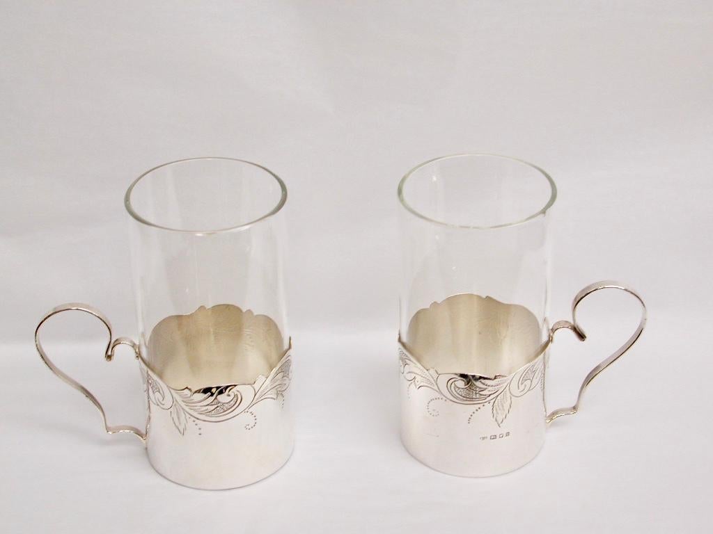 Pair of silver & glass lemon tea holders, 1925, London
Made by S Zimmermann a famous London Judaica Silversmith.