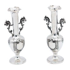 Pair of silver jugs with handles