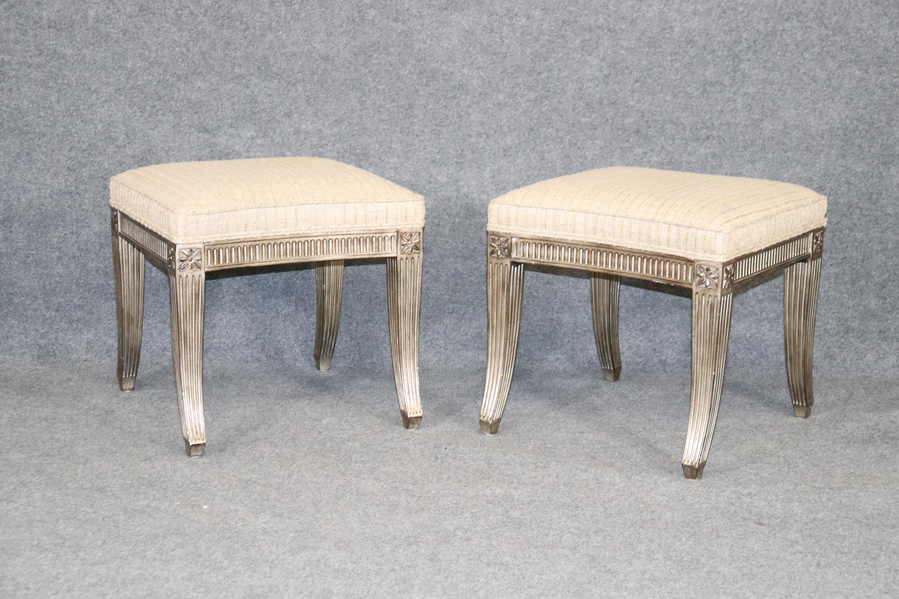 This is a beautiful and glamorous pair of silver leaf directoire benches or stools. They are perfect to add a touch of glamor that you may be missing in your home. They each measure 20 x 19 x 20 tall and are in good vintage condition. They will show