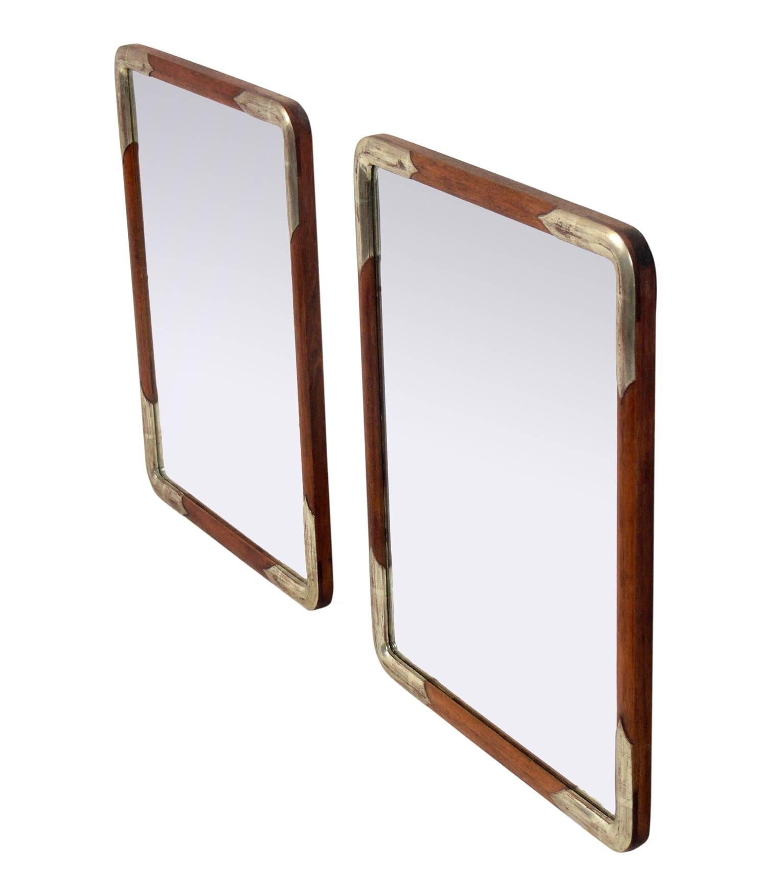Pair of silver leafed and natural wood mirrors, Japanese, believed to be circa 1950s, possibly earlier. They retain their warm original patina.