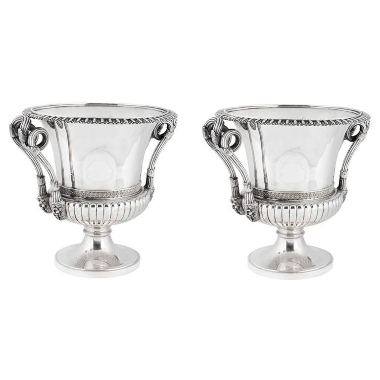 Pair of magnum-sized wine coolers in solid, sterling silver with large, ornate scrolling handles, engraved Paul Storr reproduction. Approximately 320 ounces gross weight for the pair.