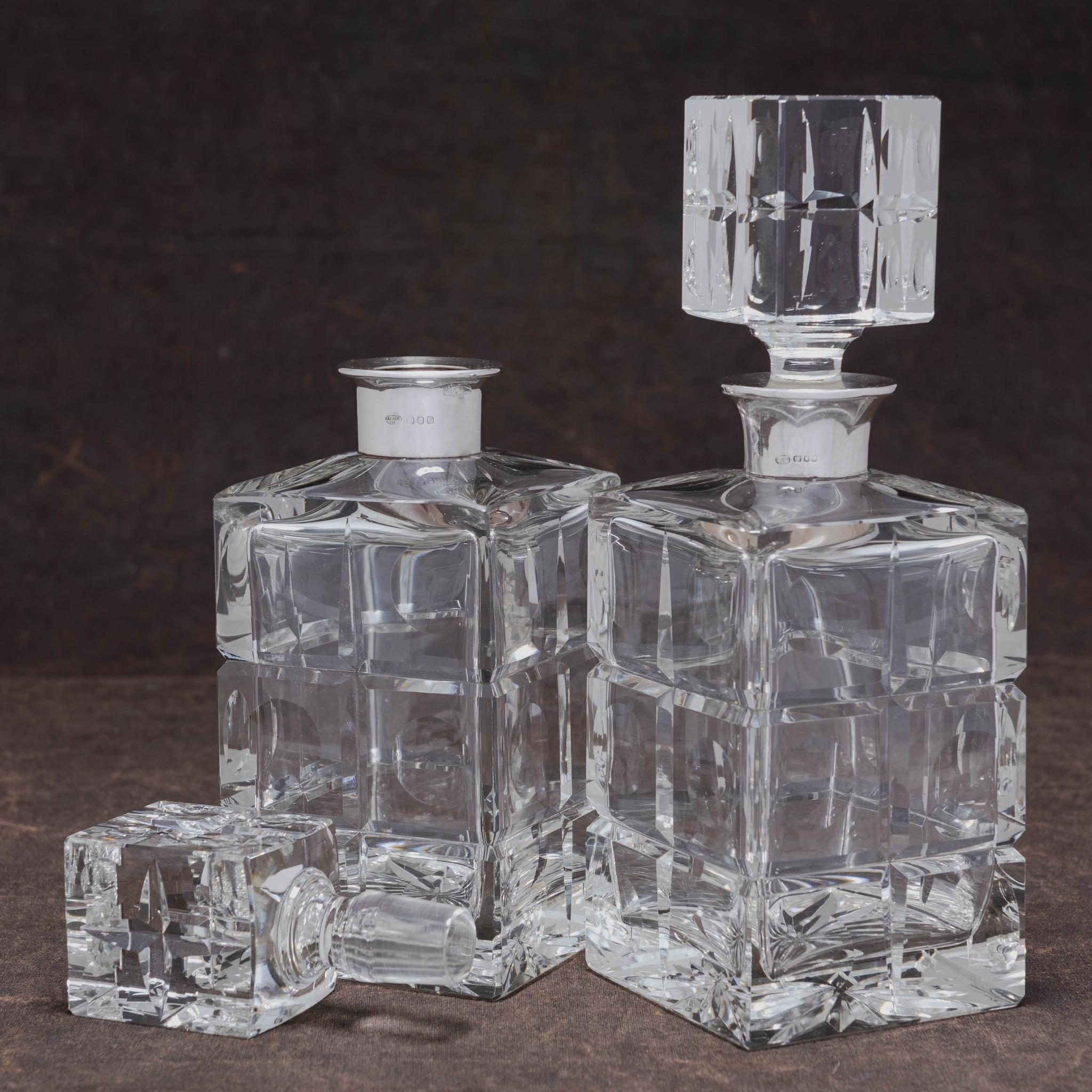British Pair of Silver Mounted Cut Glass Spirit Decanters, Hallmarked London 1966