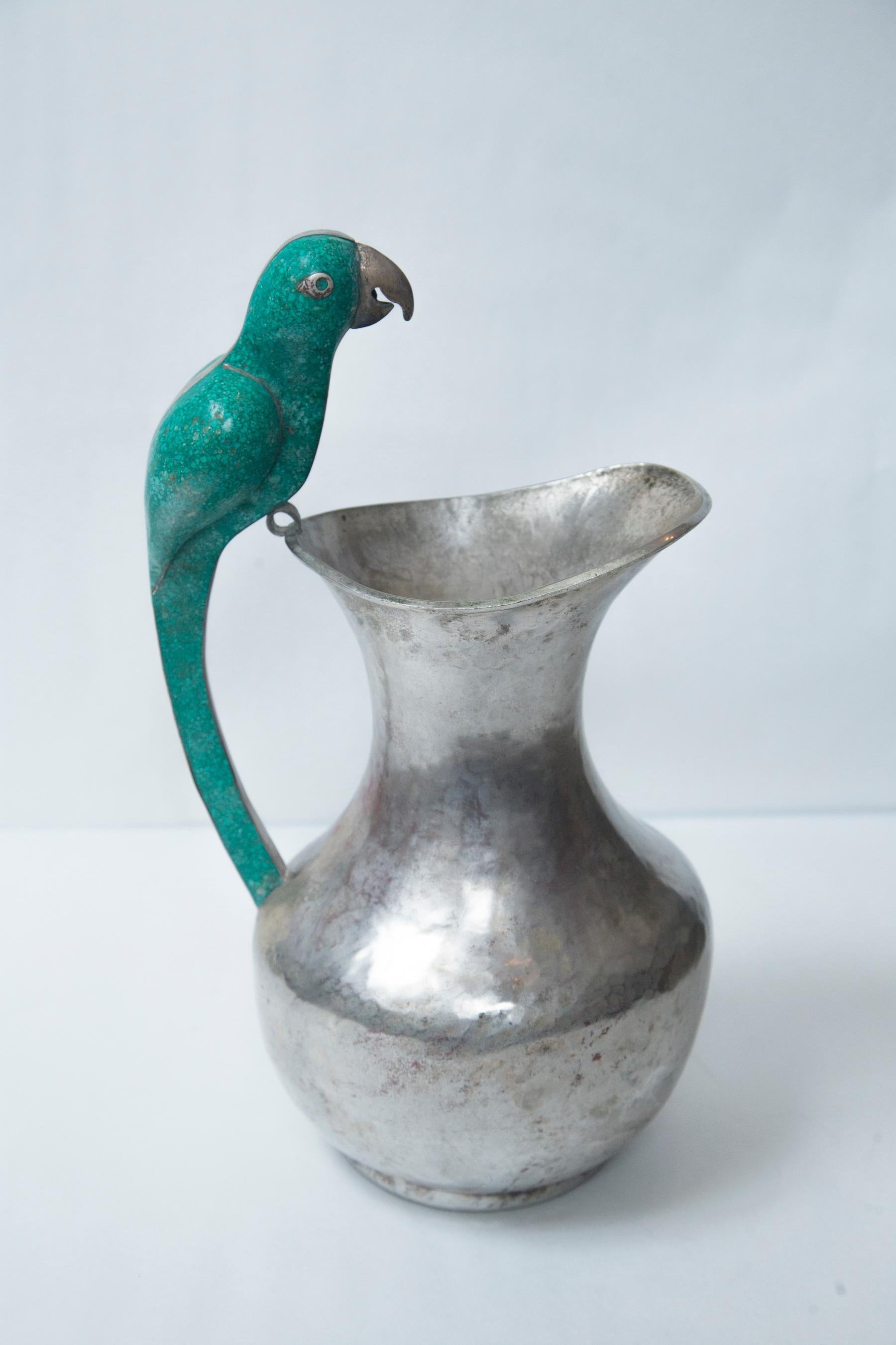 Mid-20th Century Pair of Silver on Copper Bird Handled Pitchers For Sale