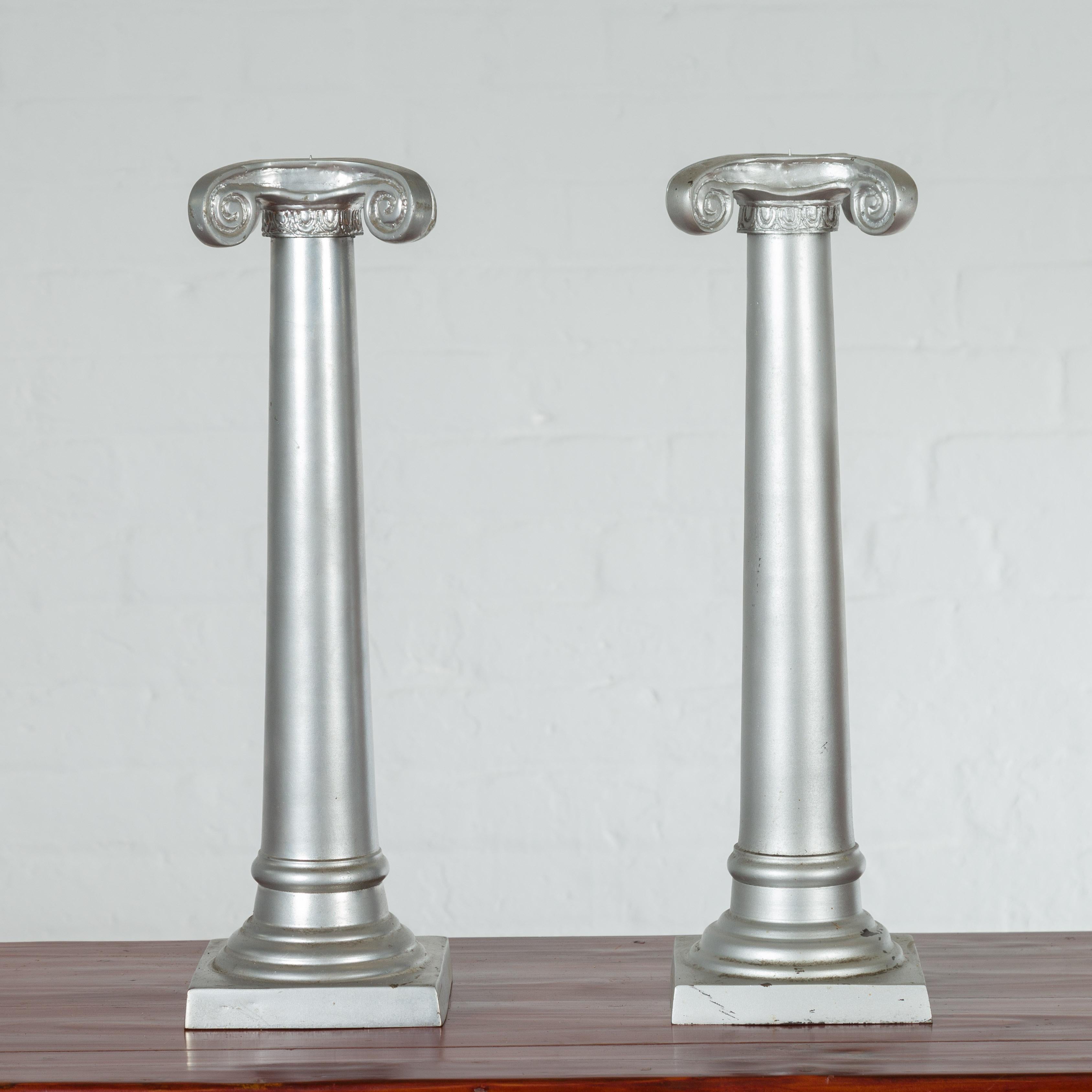 Thai Pair of Silver over Bronze Column Candlesticks with Large Ionic Capitals For Sale