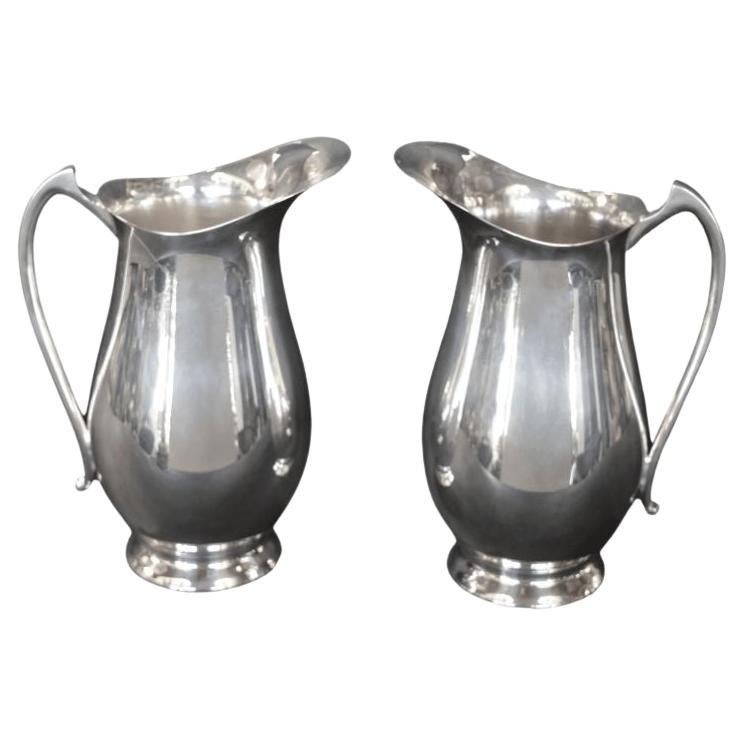 Pair of Silver Pitchers in the Style of Georg Jensen For Sale