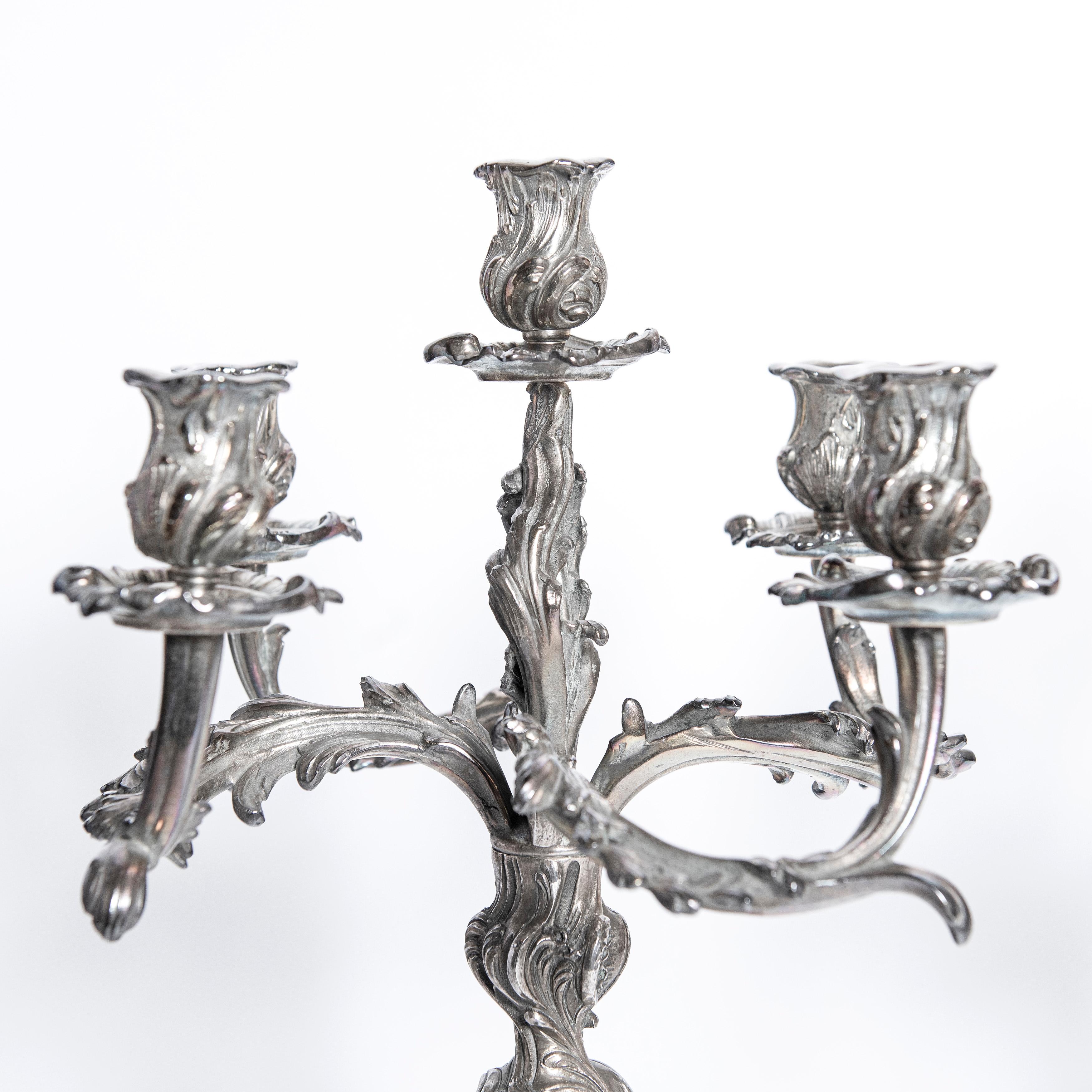 Pair of silver plate candelabras signed Christofle, France, early 20th century.