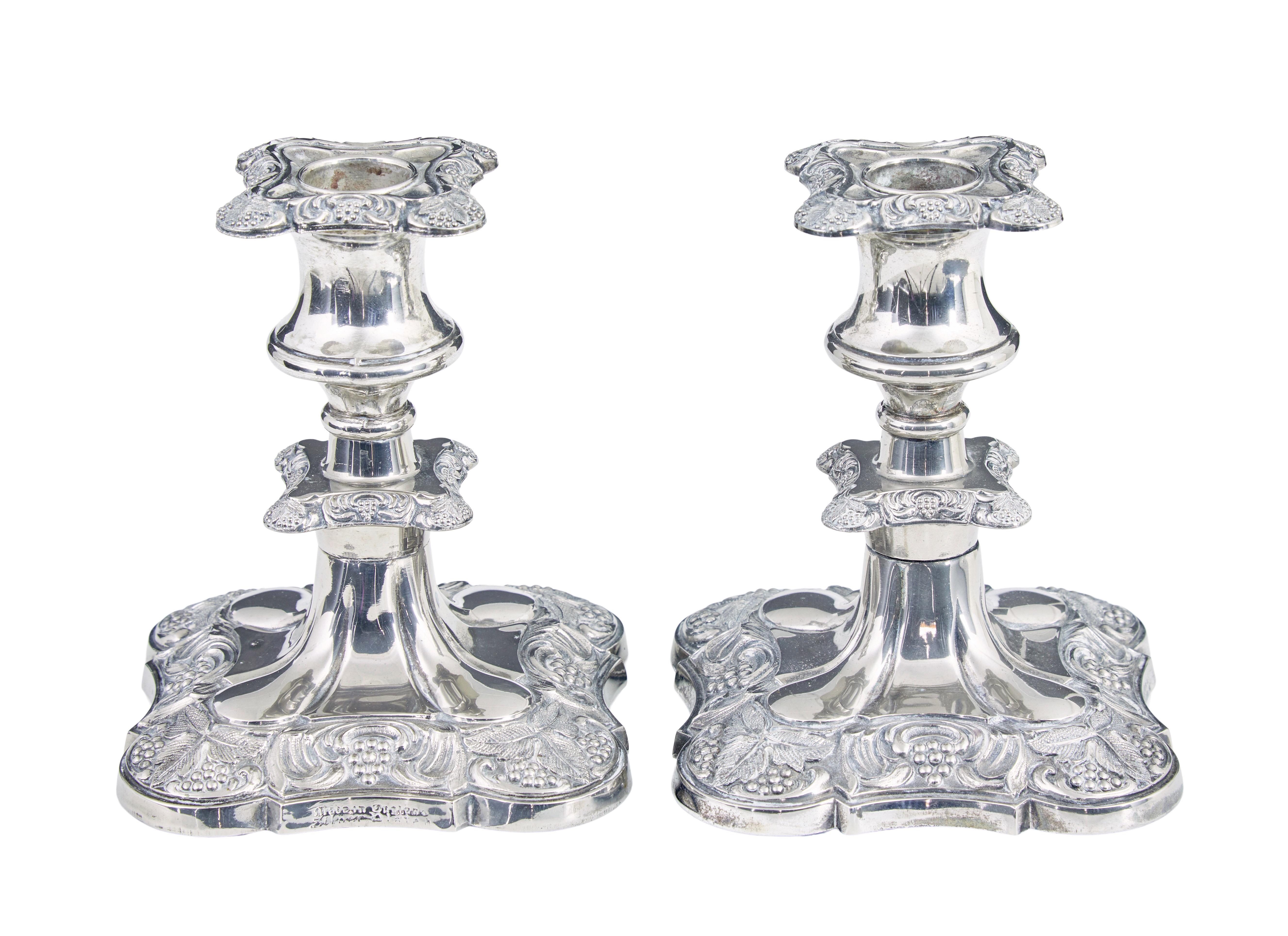 Cast Pair of silver plate candlesticks For Sale