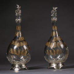 Antique Pair of Silver Plated and Engraved Glass Decanters