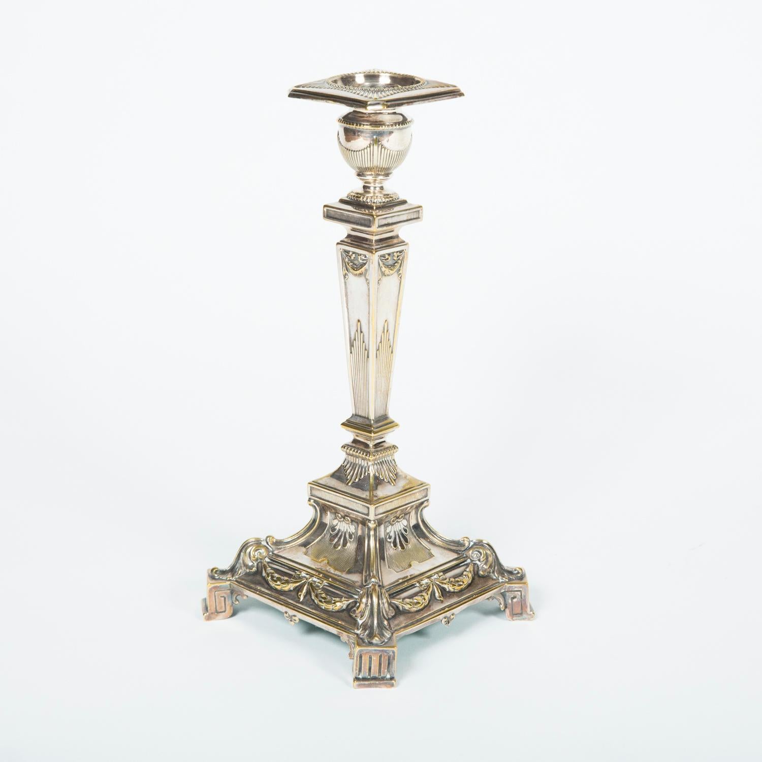 Pair of silver plated neoclassical candlesticks

With weighted bases.