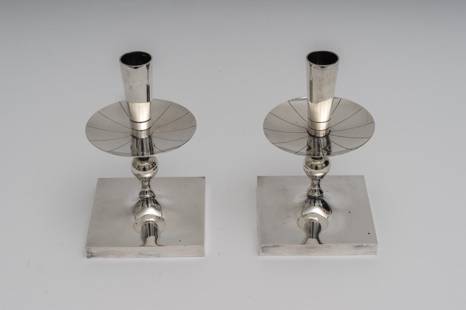 Polished Pair of Silver Plated Candlesticks