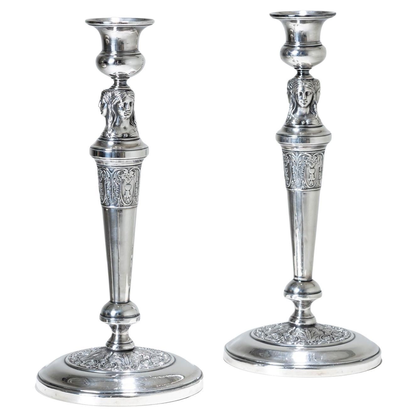 Coppia di candelabri in argento, probabilmente del XIX secolo