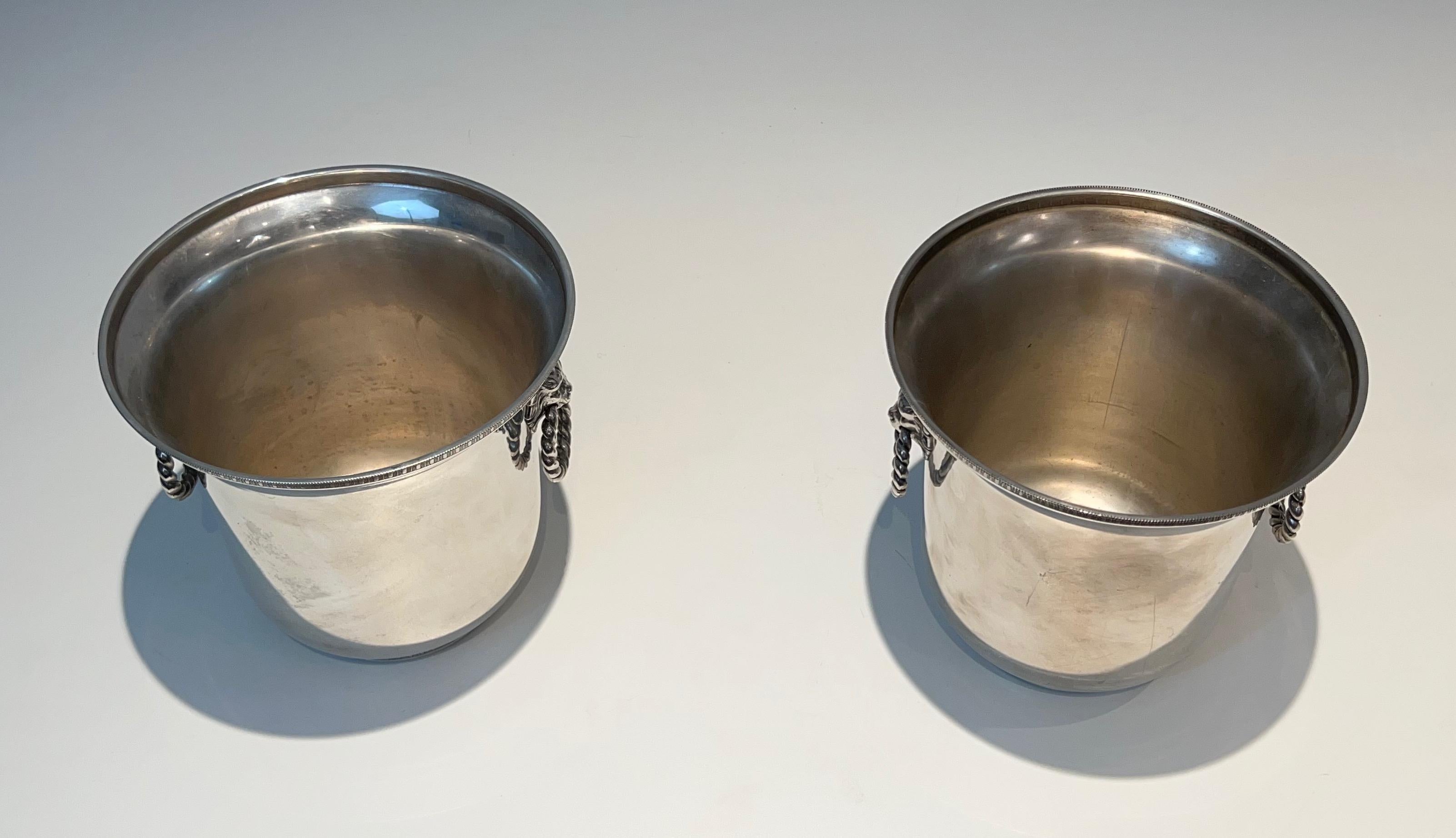 Pair of silver plated champagne buckets ornated on the handles with lion faces.  For Sale 13