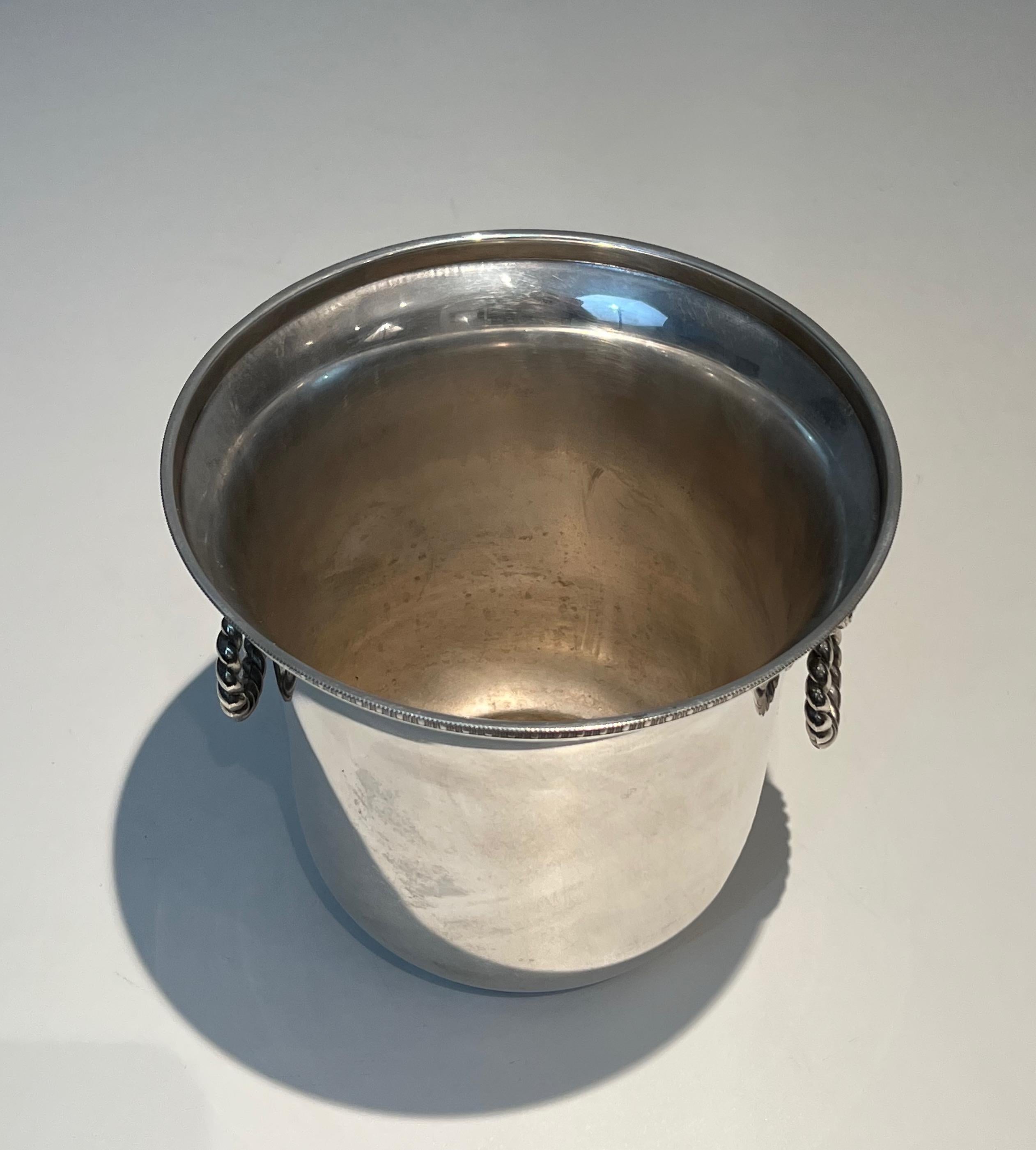 Late 20th Century Pair of silver plated champagne buckets ornated on the handles with lion faces.  For Sale