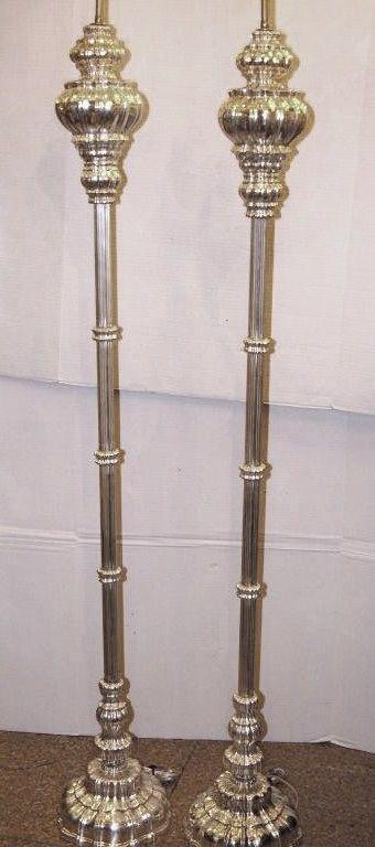 Pair of American circa 1940s silvered bronze floor lamps with original patina.

Measurements:
Height of body: 62?.