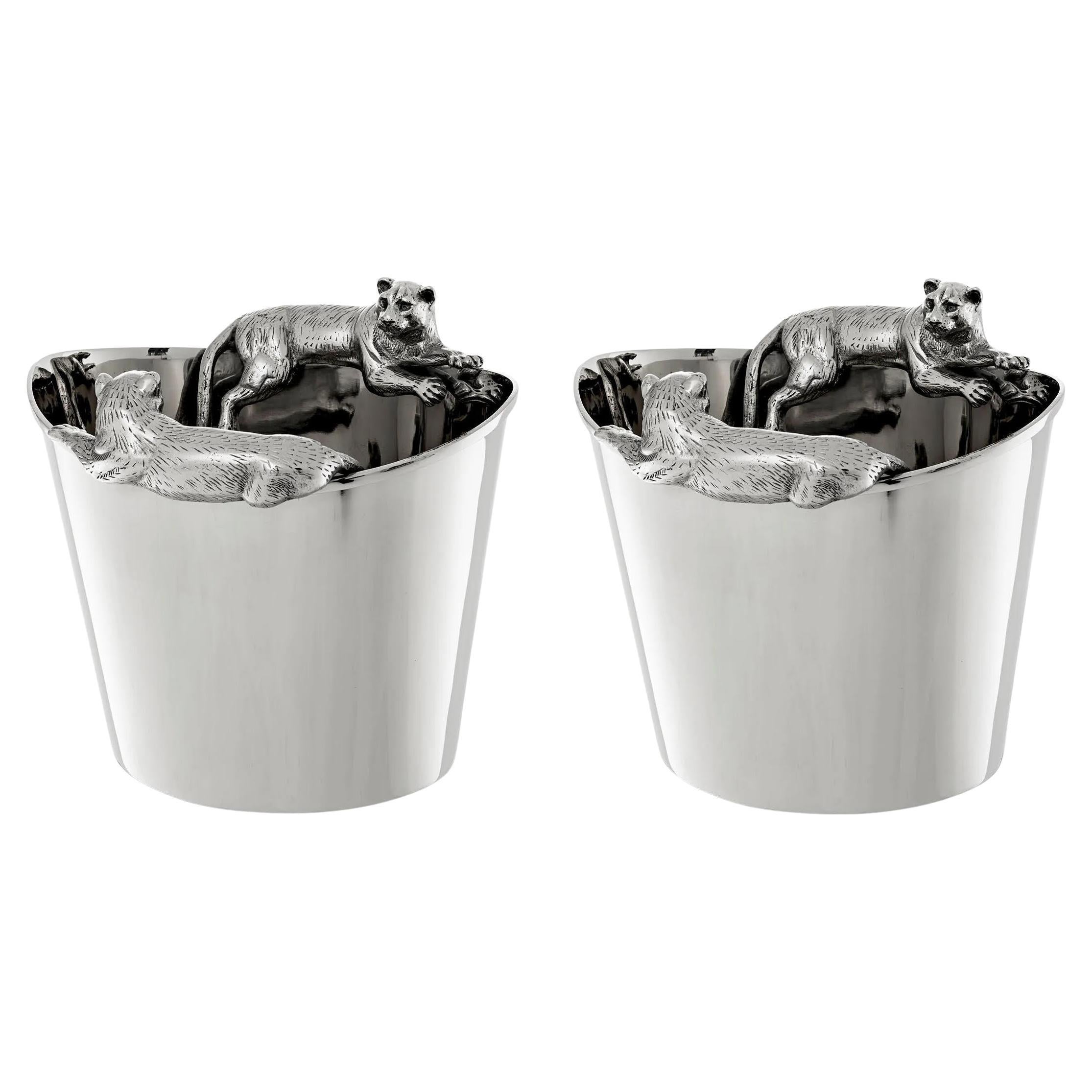 Paar versilberte Eiskübel mit Puma-Figuren.
