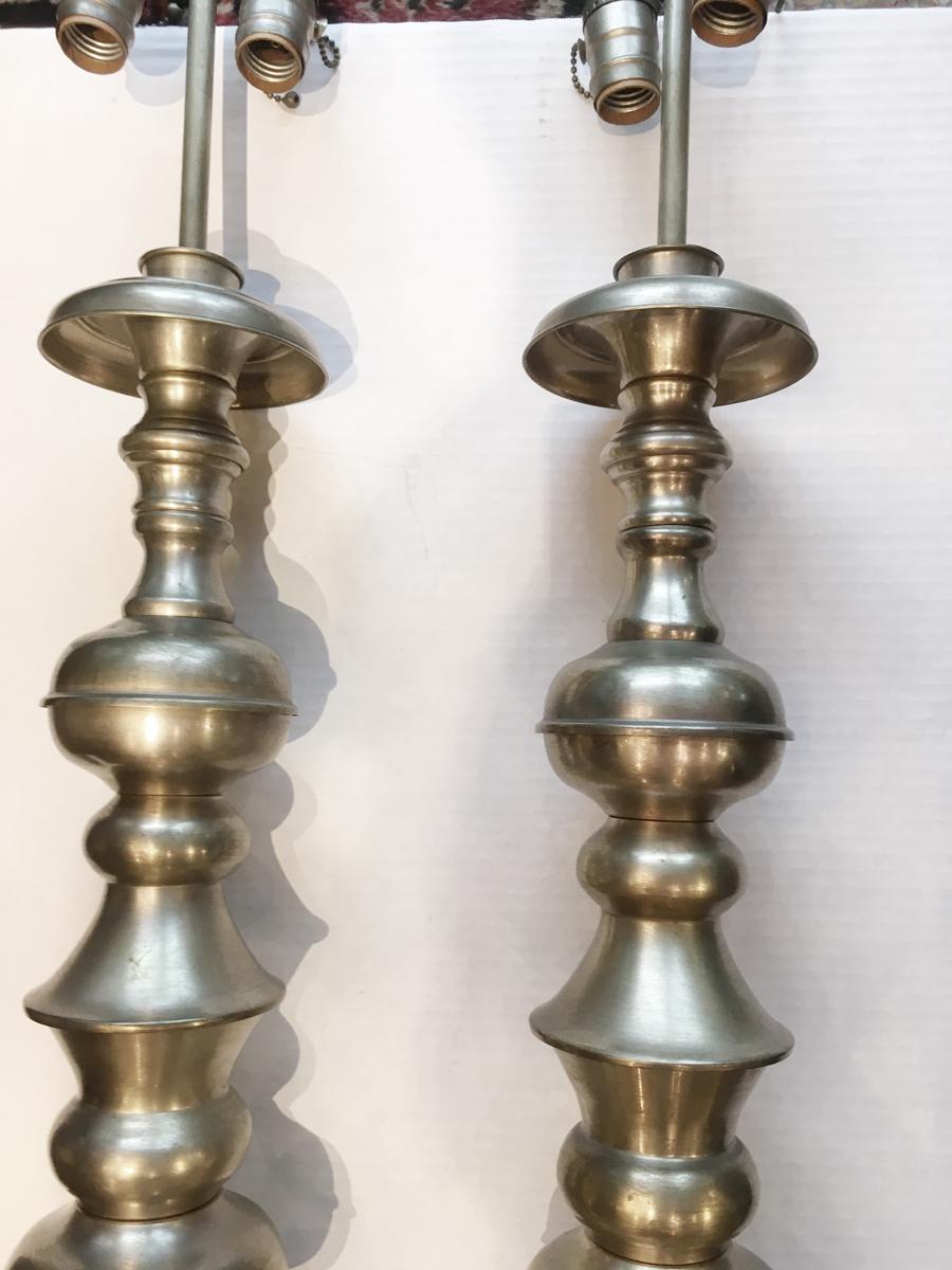 Pair of Italian large silver plated candlestick table lamps with original patina, circa 1940s

Measurements:
Height of body 27.5