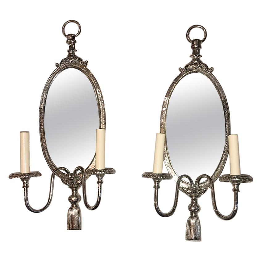 Coppia di lampade neoclassiche placcate in argento