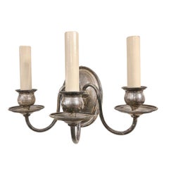 Pareja de candelabros plateados