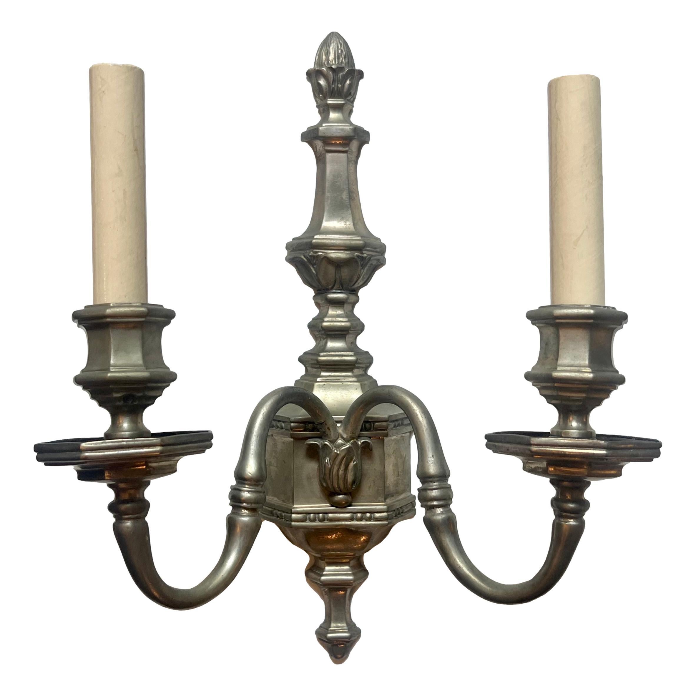 Pair of circa 1920's American silver-plated sconces with original finish.

Measurements:
Height: 14