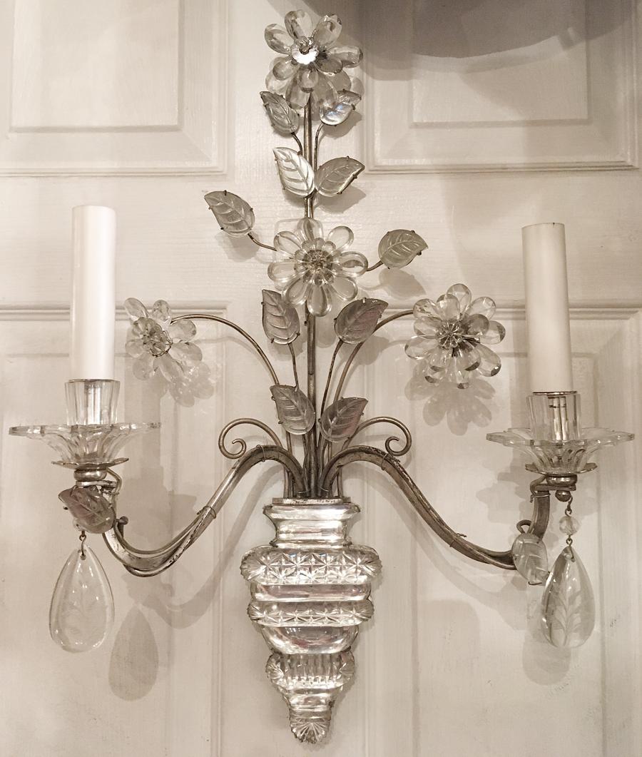 Pair of circa 1950's French silver leafed metal two arm sconces with crystal flowers and molded glass body.

Measurements:
Height 22