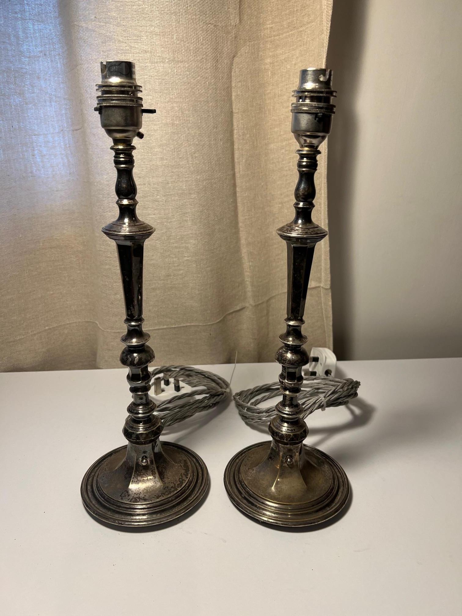 Exceptional quality pair of Edwardian, made directly for electricity lamps.

Probably, because of their quality they were made by Faraday & Sons in the west end of London.

The faded patination on these lamps blends very well with any