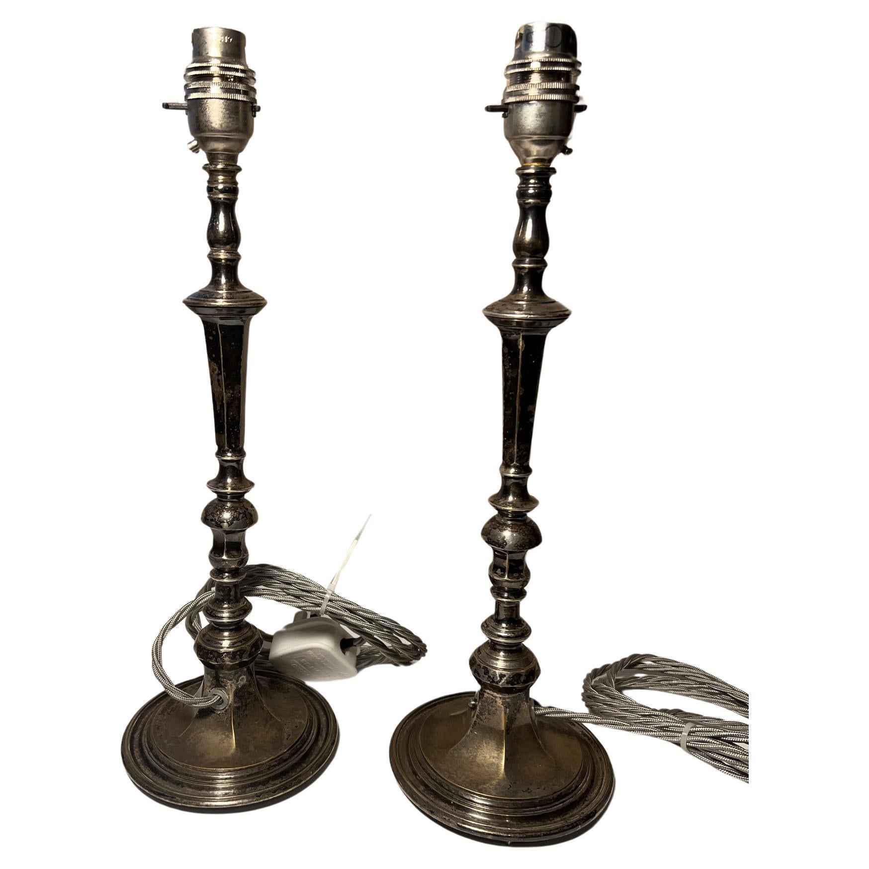 Pair Of Silver Plated Table lamps For Sale