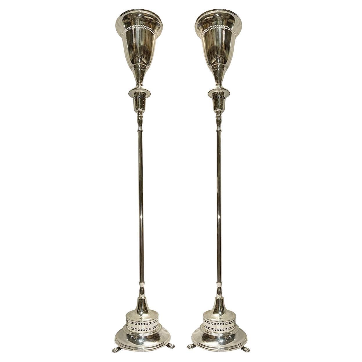 Coppia di torciere placcate in argento