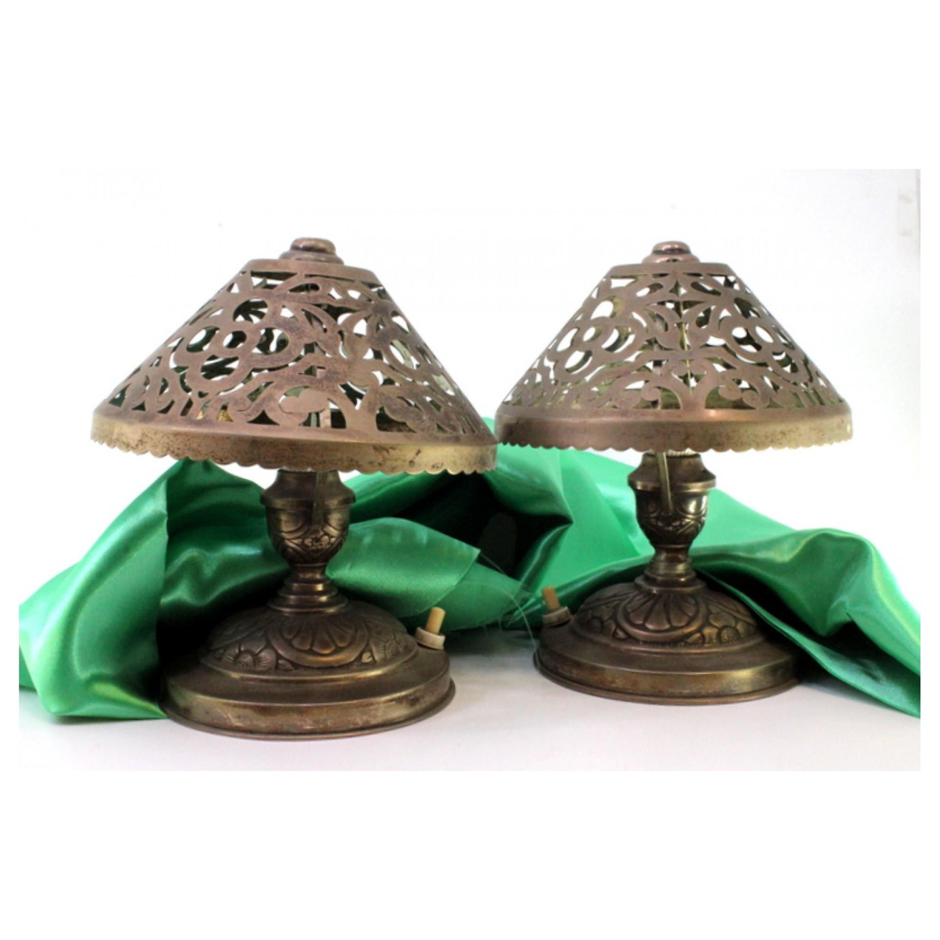 Pair of silver table lamps on circular relief bases, electrified For Sale