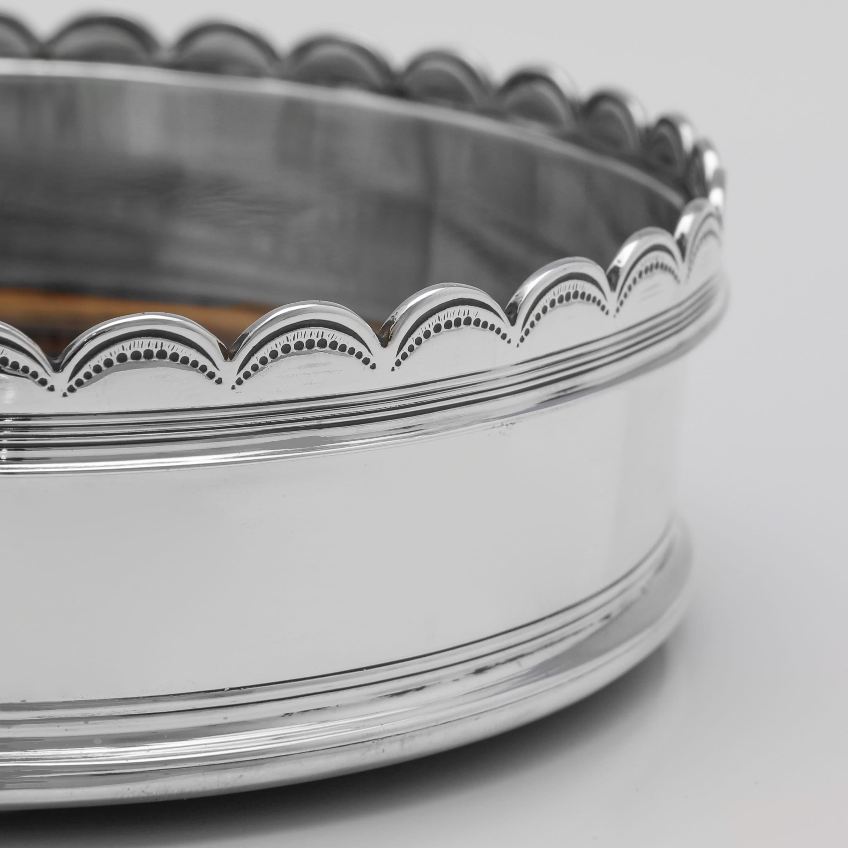 Early 20th Century Pair of silver wine coasters & original glass decanters - Mappin & Webb 1927