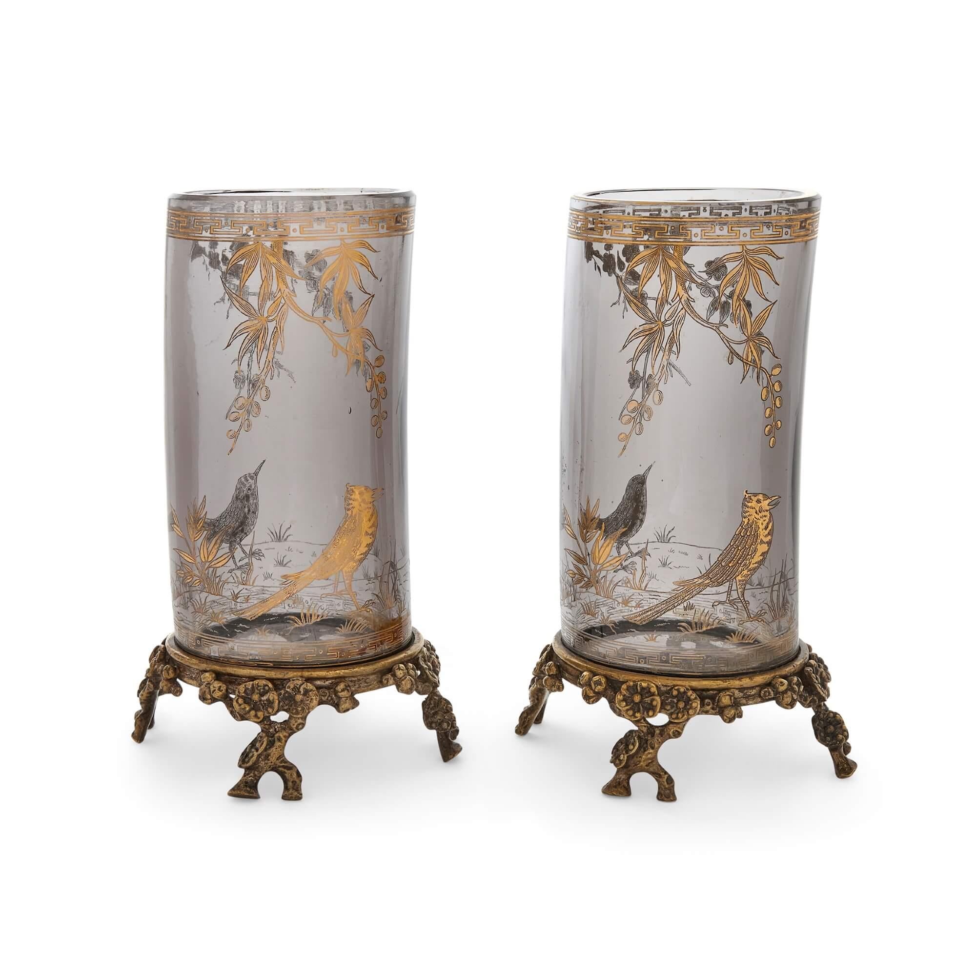 Pair of silvered and gilt-bronze mounted glass vases by Baccarat
French, 19th Century
Height 20cm, width 13cm, depth 11cm

Mounted with silvered bronze and ormolu, these beautiful glass vases were made by the leading French firm Baccarat, taking