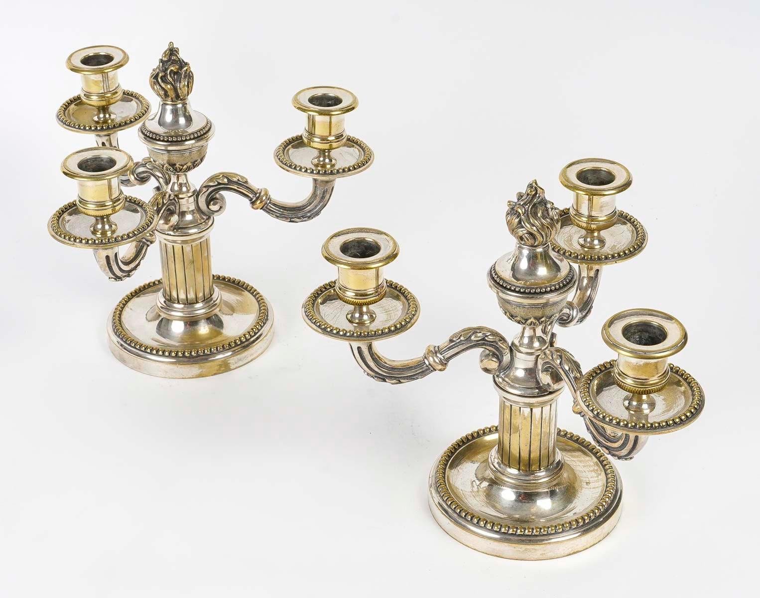 Pair of Silvered Bronze Candelabra, 19th Century, Napoleon III period.

A pair of three-branched silvered bronze candelabra, 19th century, Napoleon III period.
H: 23cm, d: 25cm