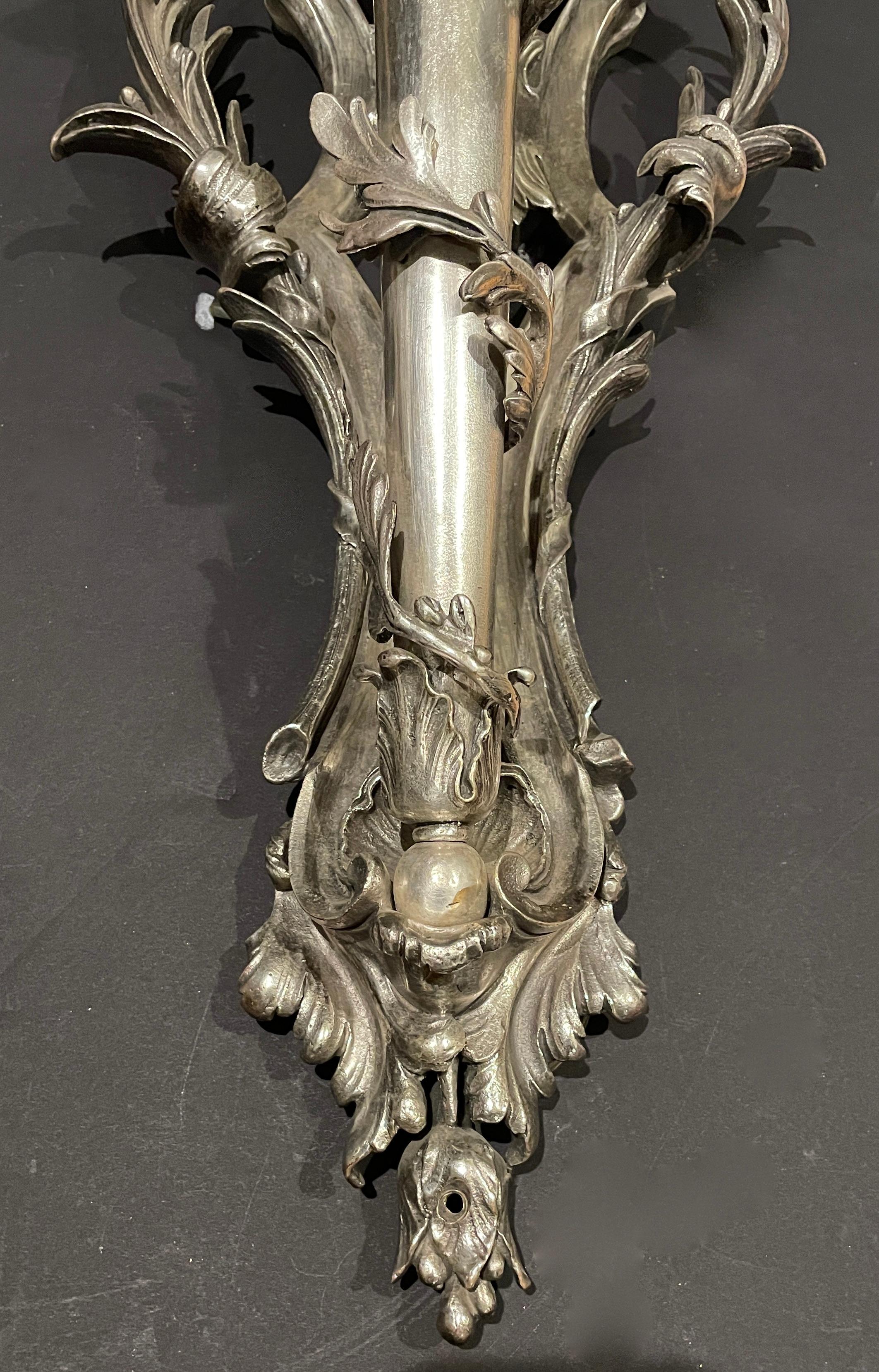 Silver Plate Pair of Silvered Bronze Louis XV Sconces For Sale