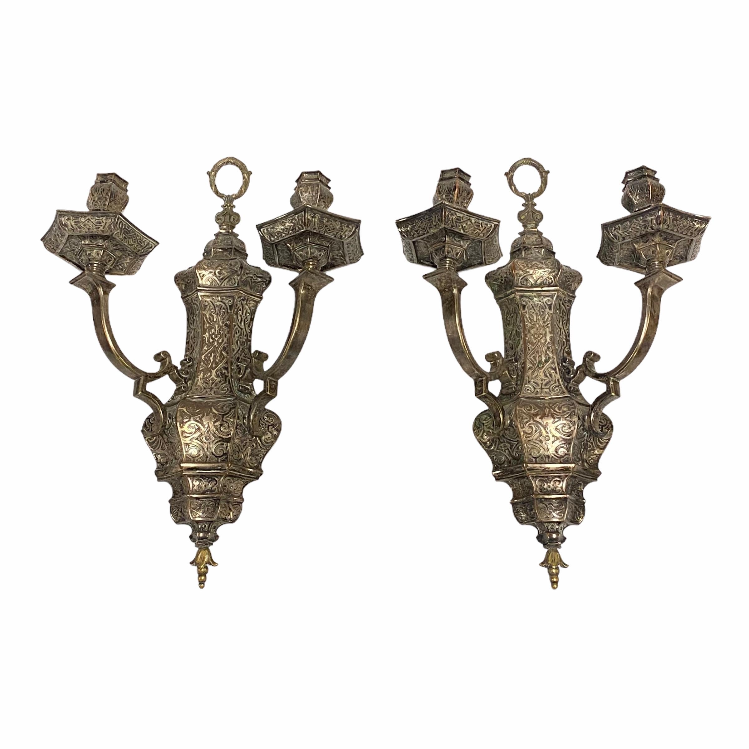 Pair of Moorish style silvered two-light wall sconces attributed to Caldwell & Co.