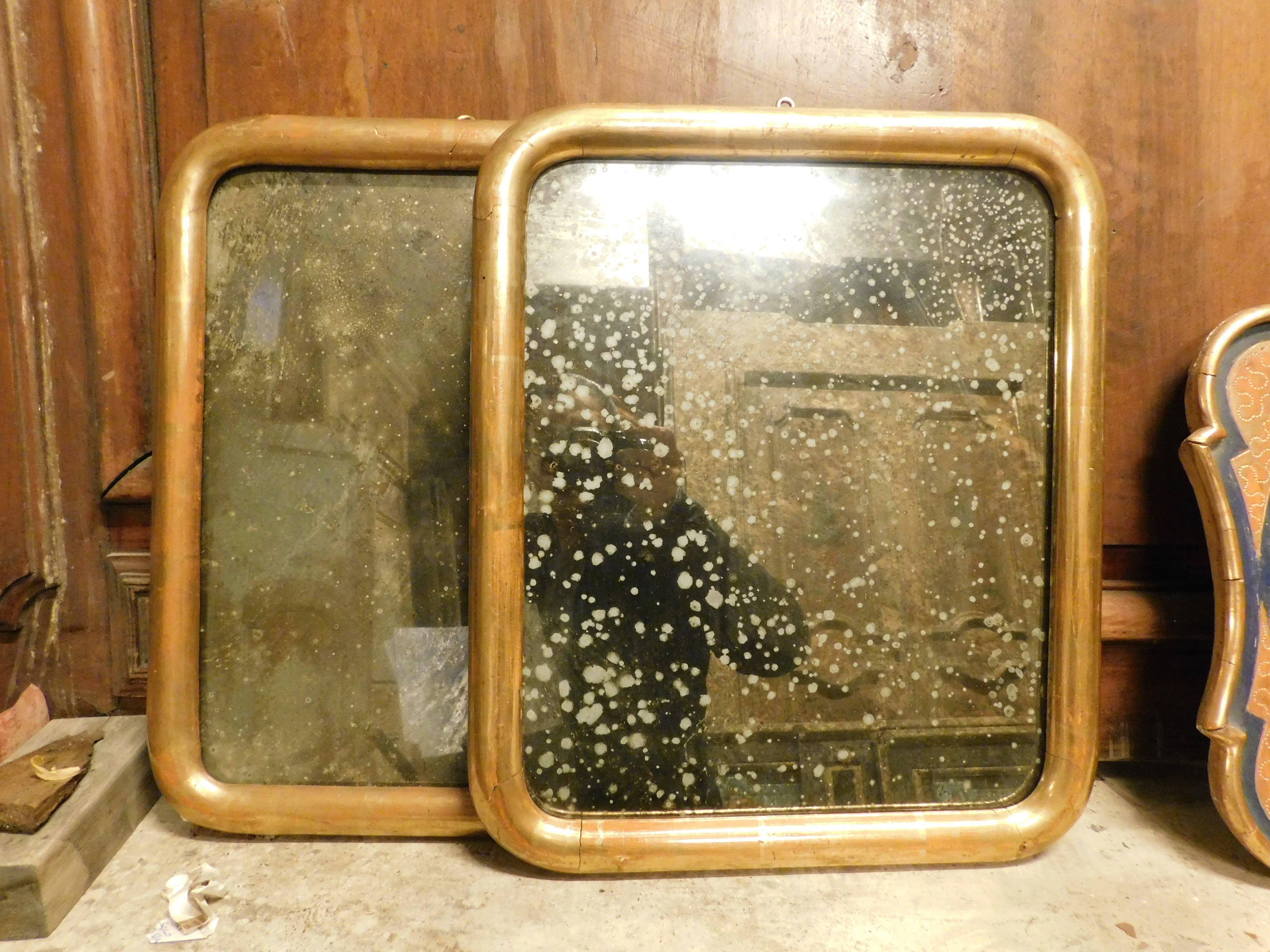 Gilt Pair of simple gilded wooden mirrors, Italy For Sale