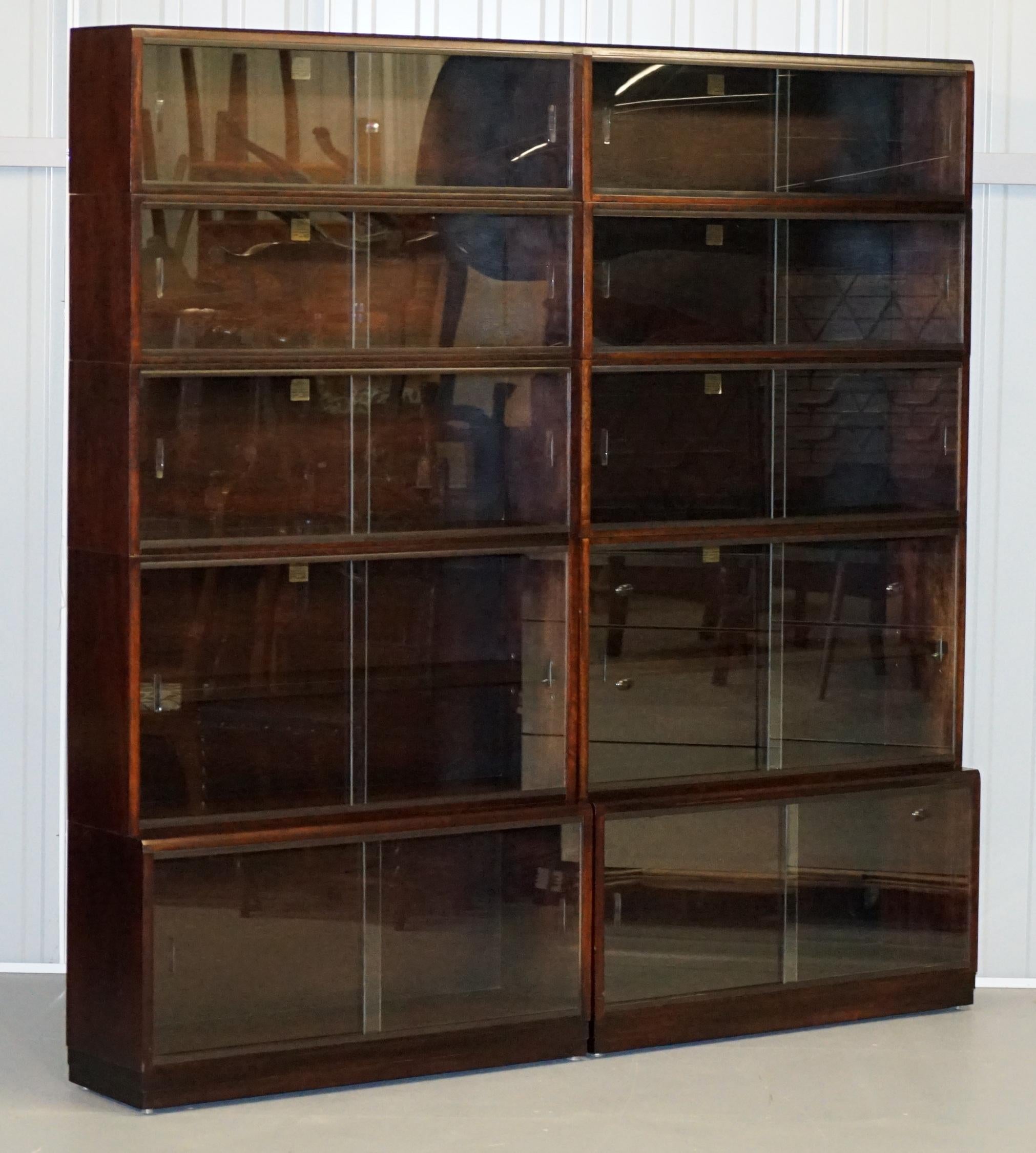 We are delighted to offer for sale this stunning pair of Simplex modular legal library stacking bookcases

A very good looking well made and decorative pair of legal library stacking bookcases. These are modular which means each piece can be