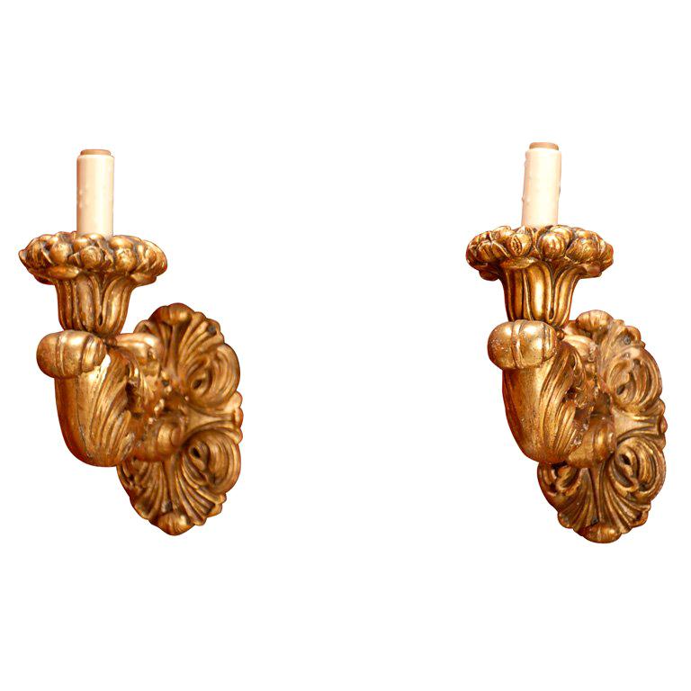 Pair of single arm gilt wood sconces