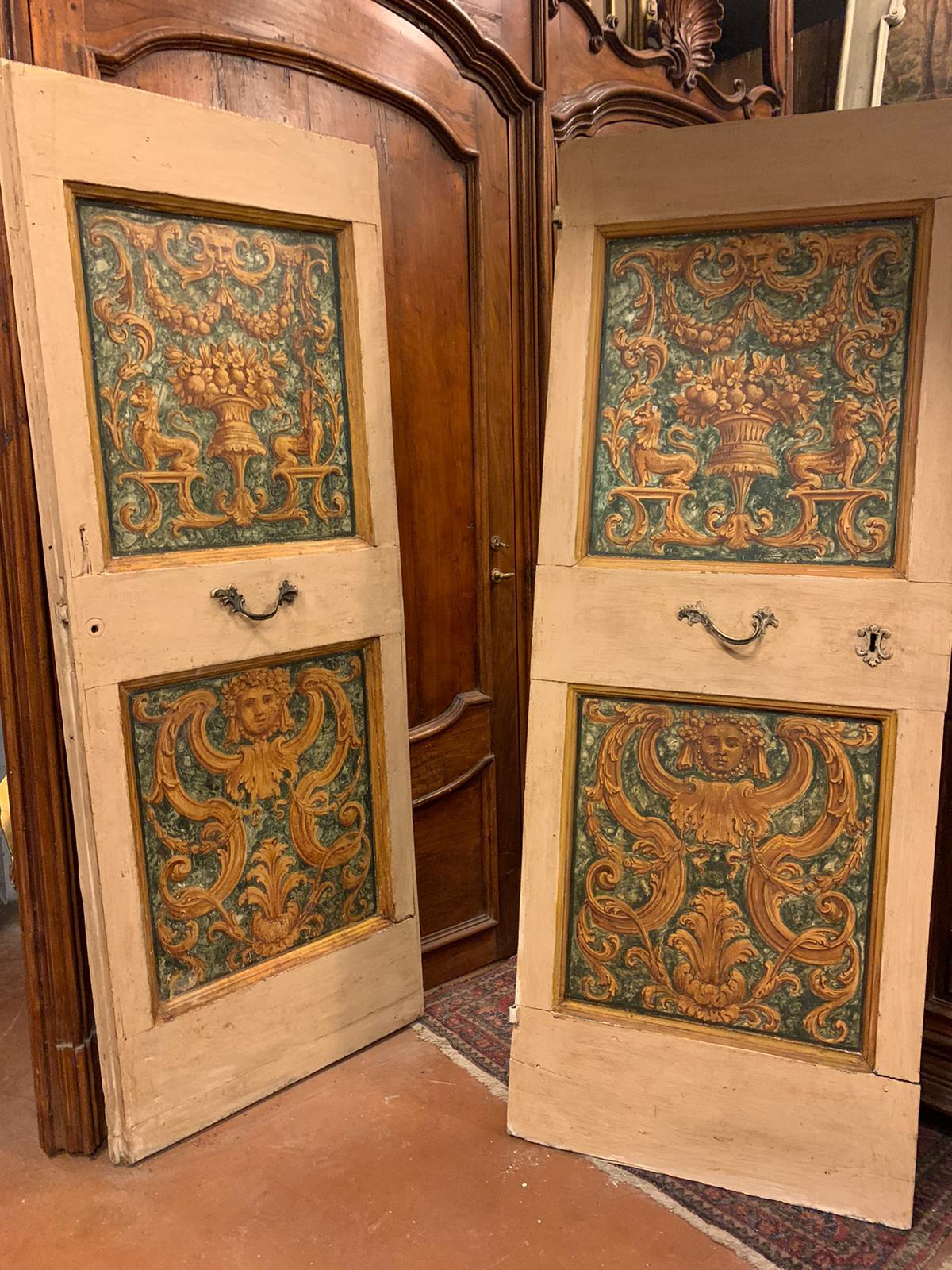 Antique pair of single interior doors, lacquered and hand painted with rich prestigious decoration, smooth back like most of the doors of the time, they had original rabbet and irons for mounting directly to the wall, hand-built in the middle of the