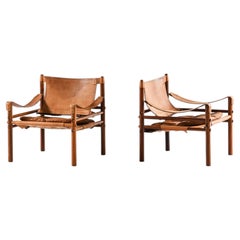 Pair of Sirocco Easy Chairs in Leather & Rosewood by Arne Norell, 1964