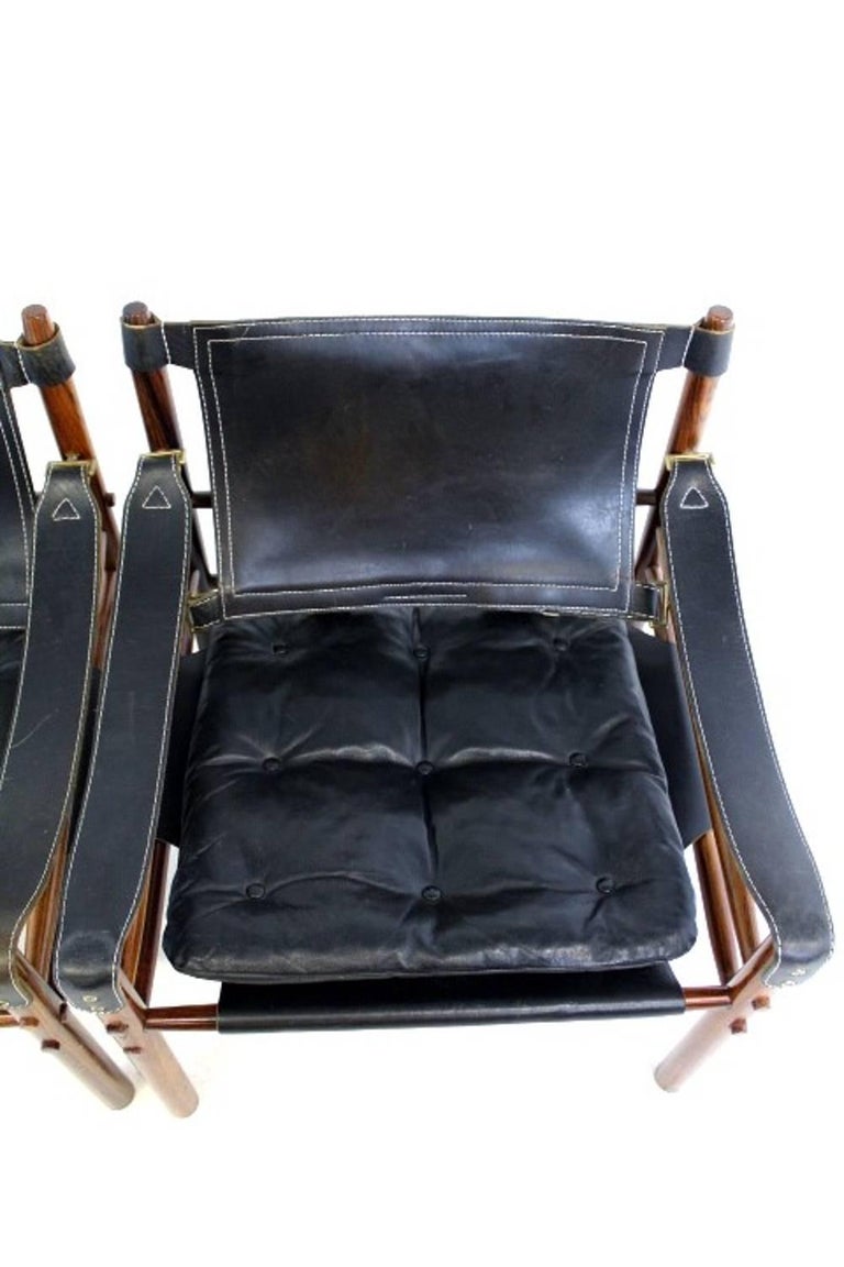 Swedish Pair of Sirocco Safari Chair by Arne Norell Black Leather For Sale