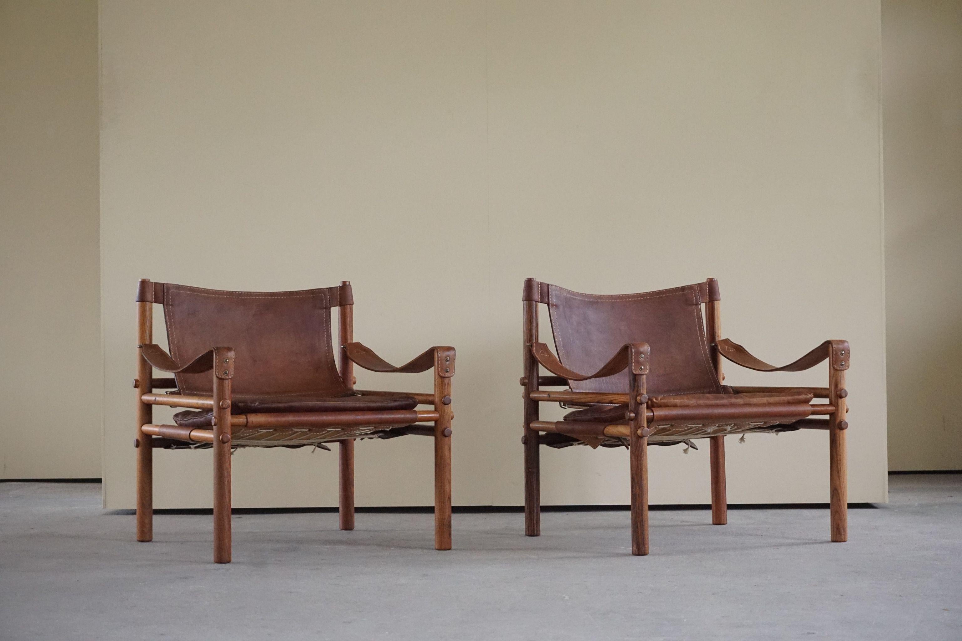 Leather Pair of Sirocco Safari Chairs, Made by Arne Norell AB in Aneby Sweden, 1960s
