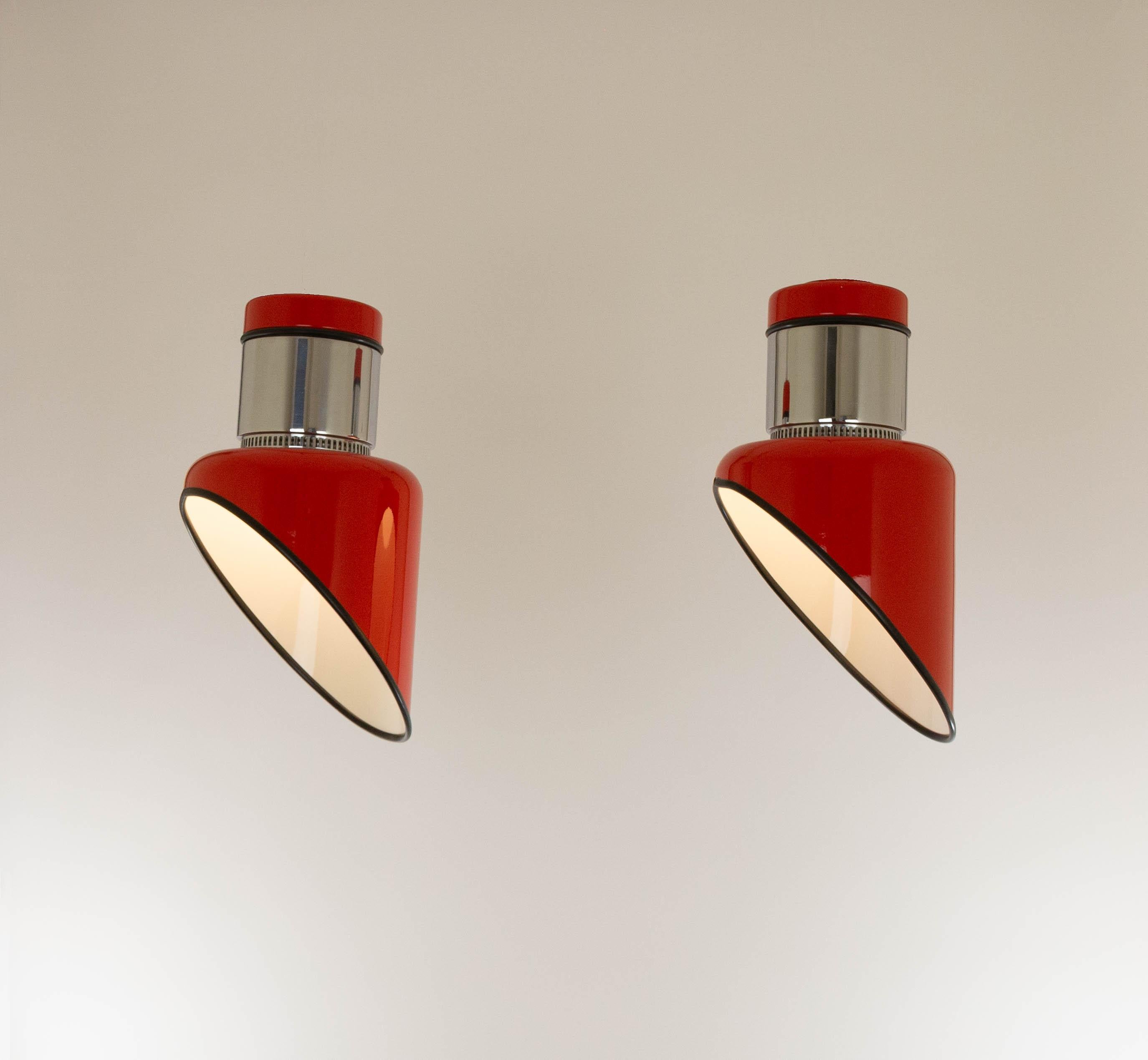 A pair of Sisten ceiling lamps designed by Gianni Celada and produced by Fontana Arte in the 1970s.

These Sisten ceiling lamps are part of the Sisten series; consisting of various wall and ceiling lamps, all with (interchangeable) opaline glass