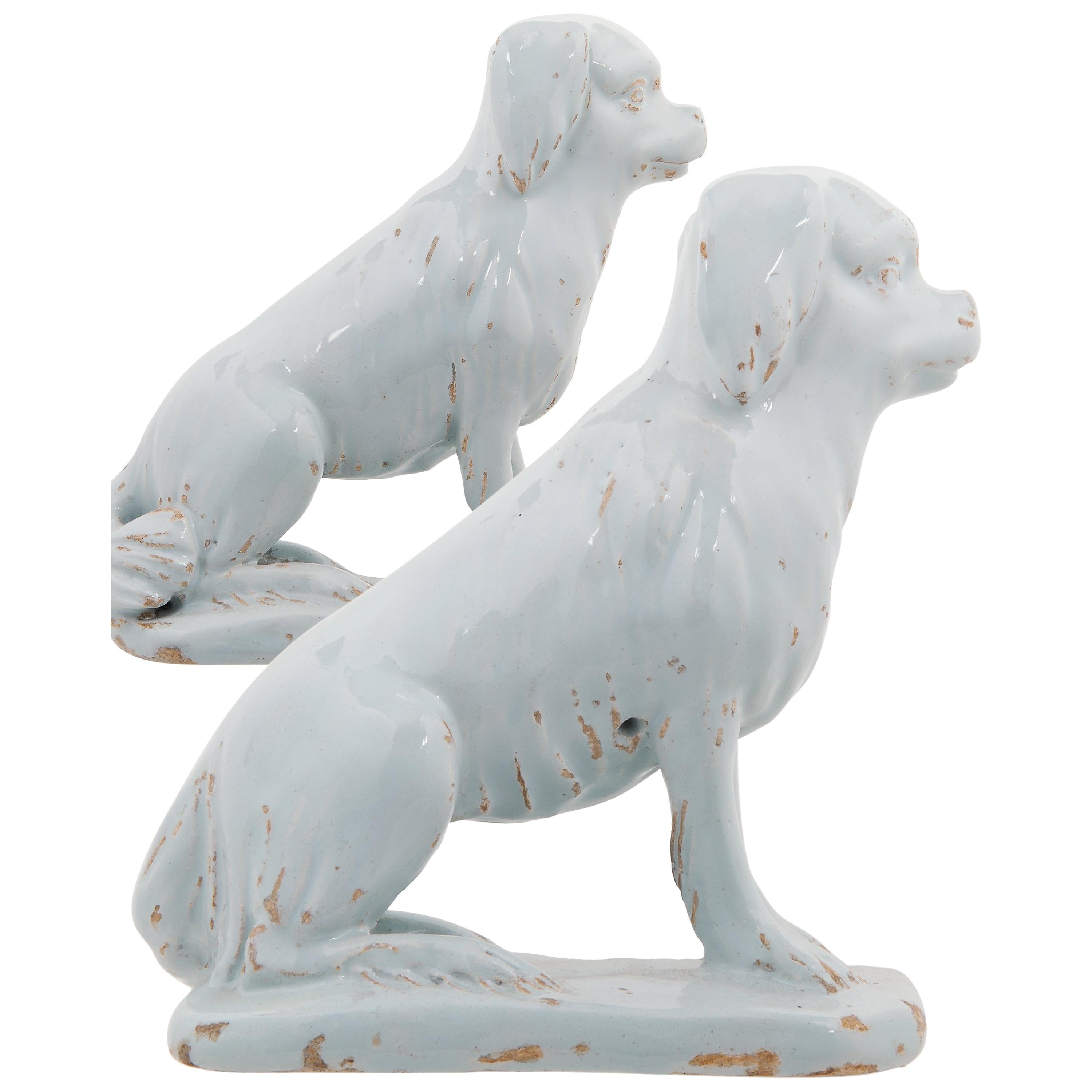 Pair of Sitting Dogs in White Dutch Delftware For Sale