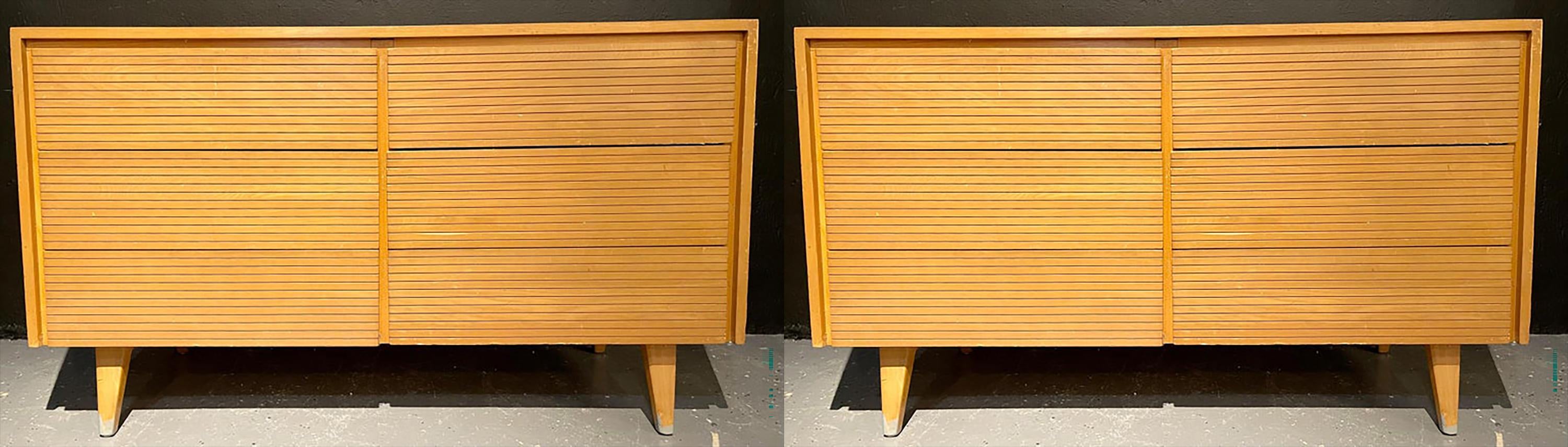 Pair of six-drawer Mid-Century Modern chests, dressers or nightstand commodes. Each in a fine teak finish having three by three drawers on tapering rounded legs. The case in need of some refinishing. Priced accordingly. We can have these fully